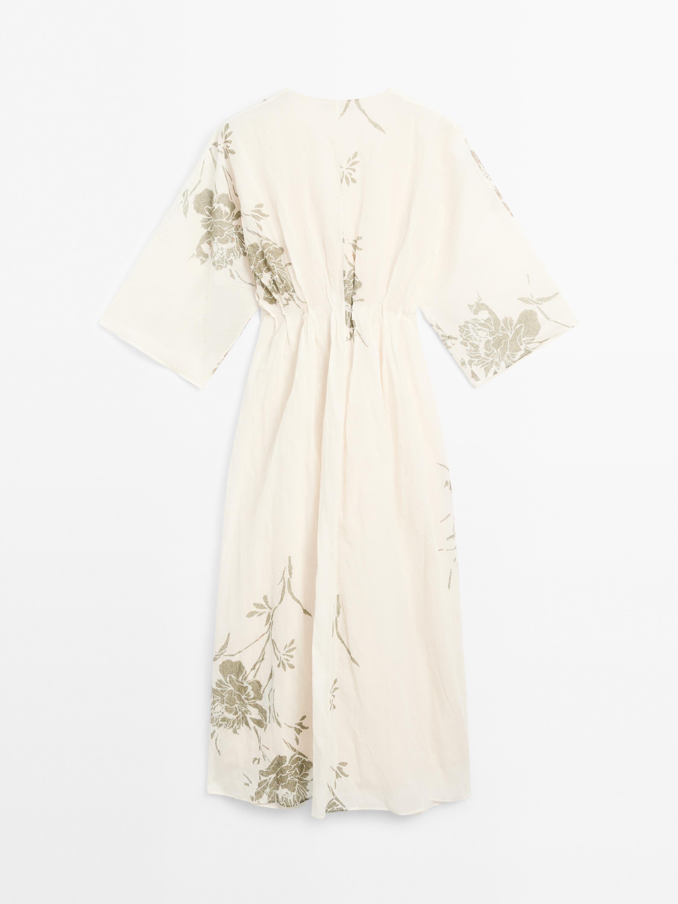 Dress with floral print fabric detail