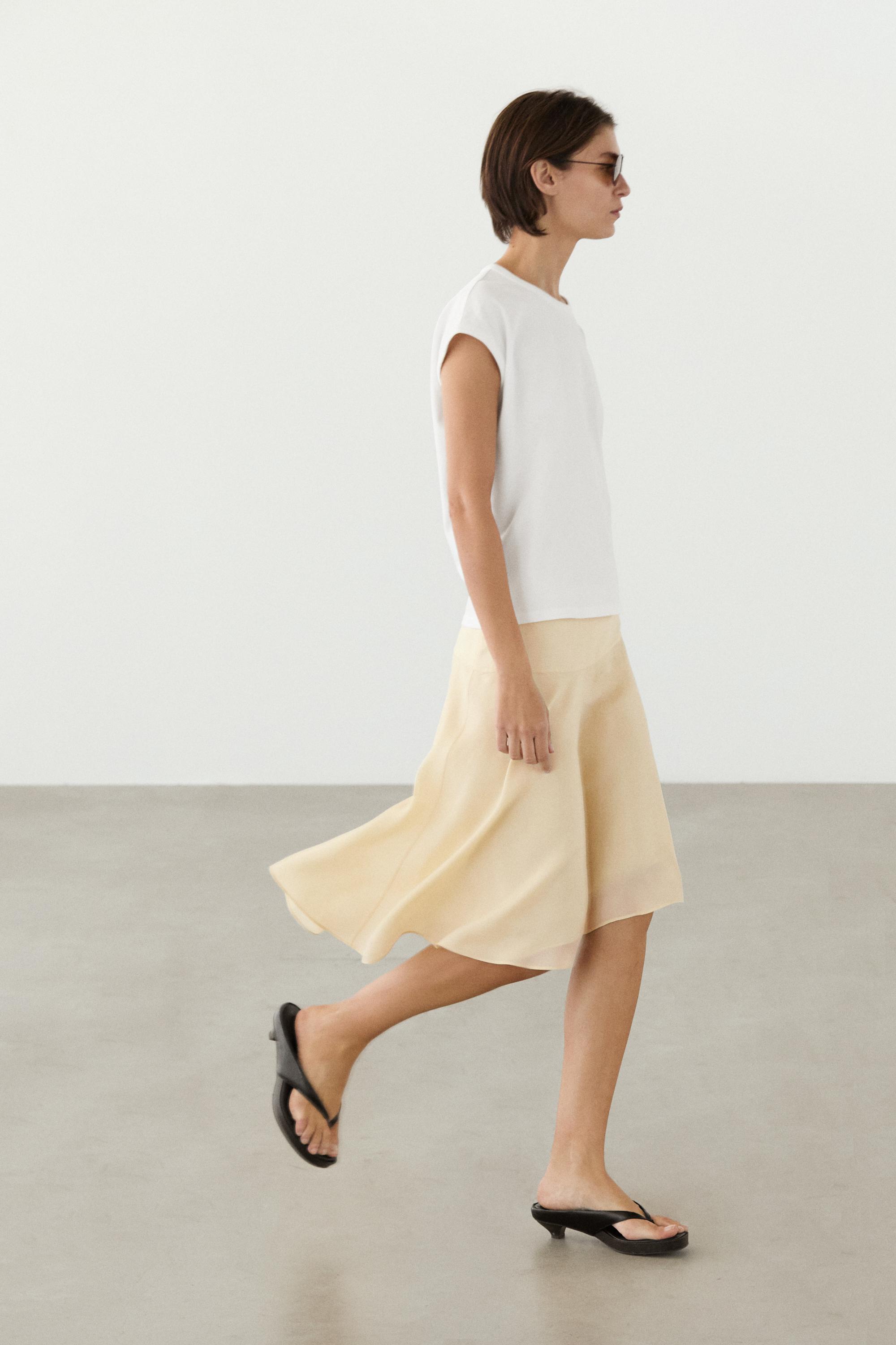 Flowing asymmetric midi skirt — Gold