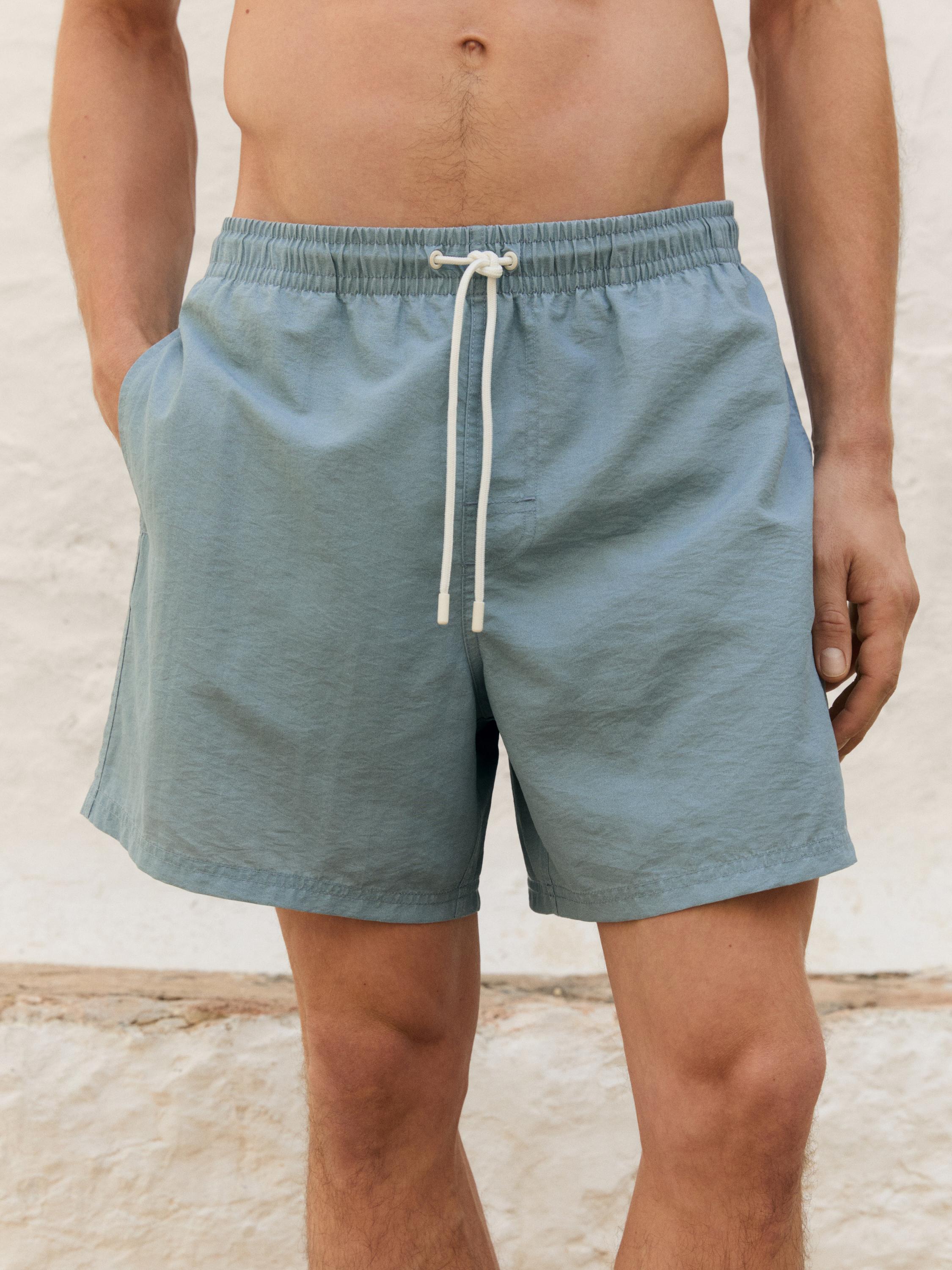 Plain regular fit swimming trunks