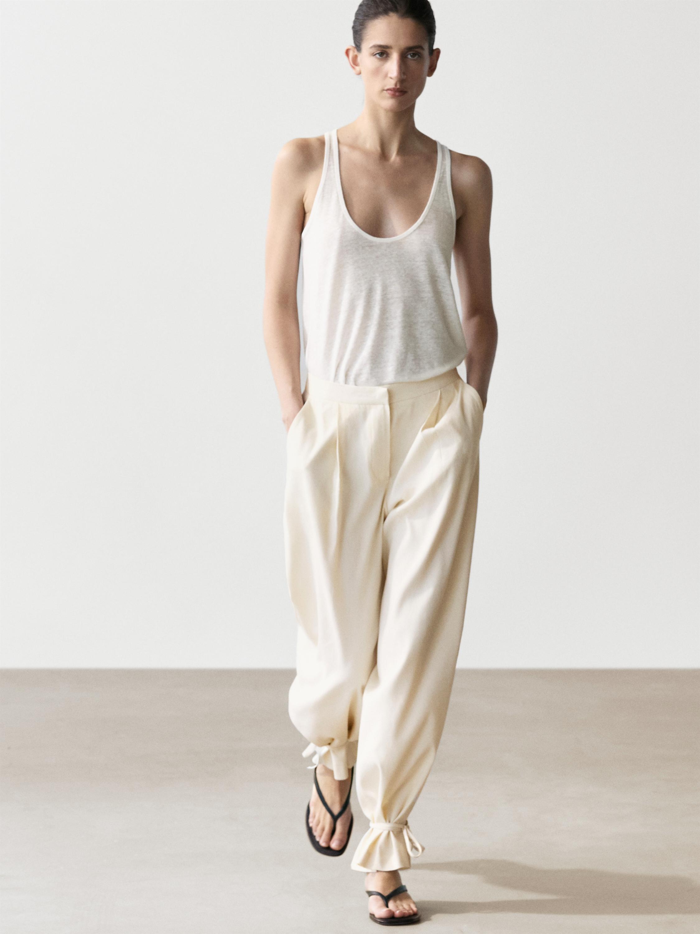 Flowing barrel fit trousers — CREAM