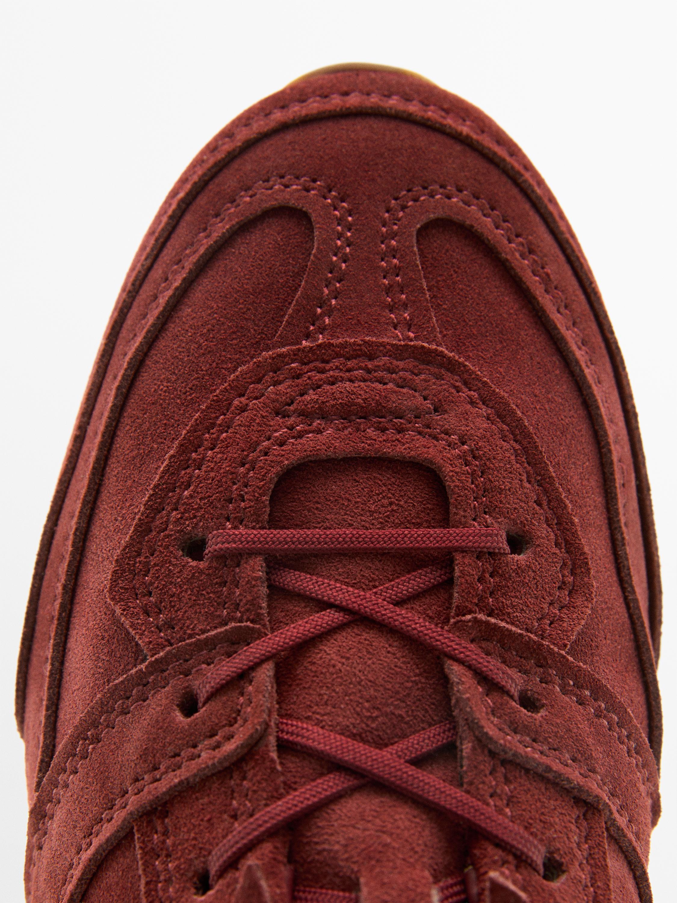 Split leather trainers with piece details — RED