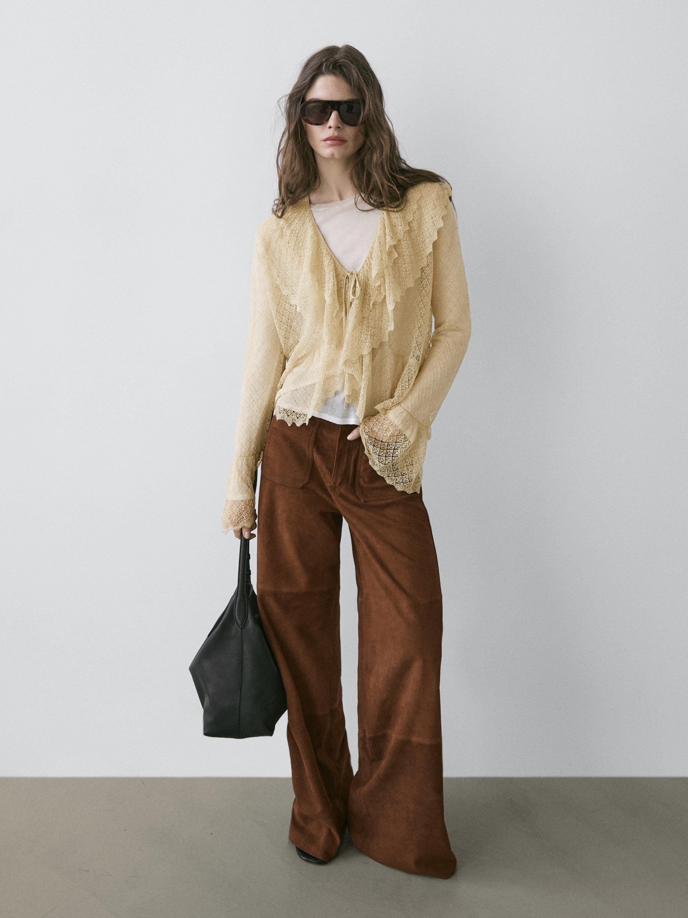 Pantalon large poches en cuir et daim