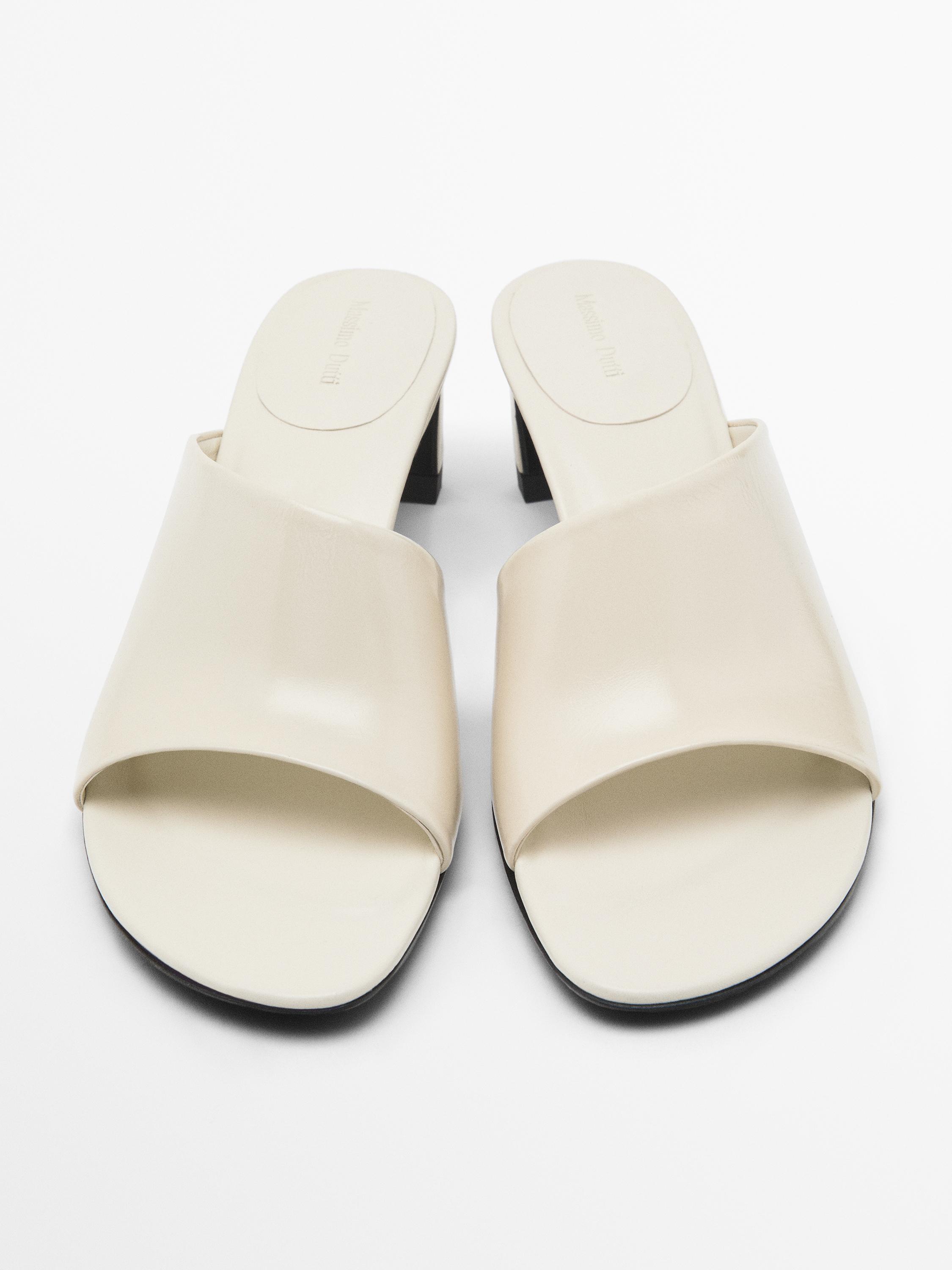 حذاء جلد مسطح بكعب عال