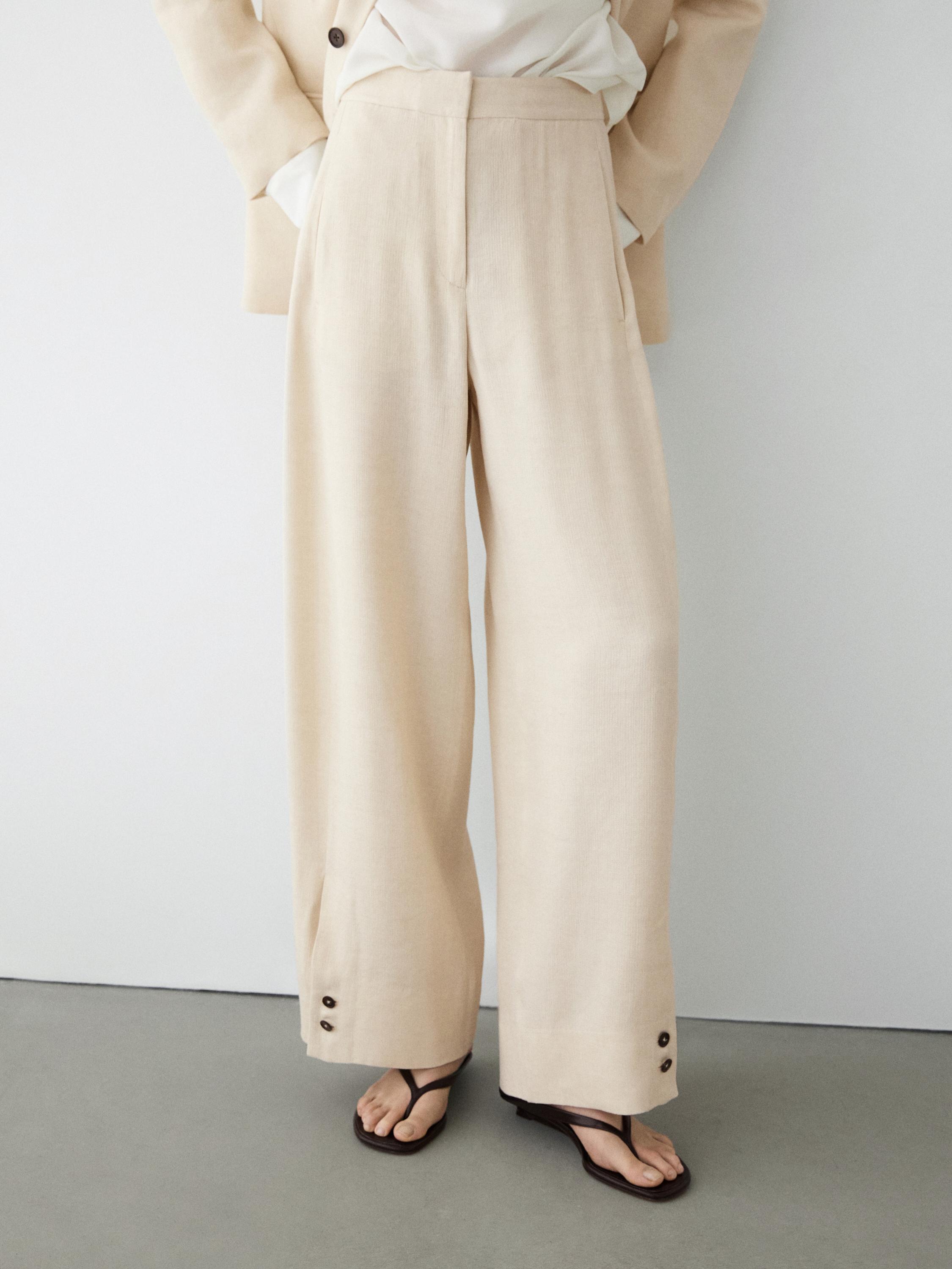 Linen blend suit trousers with button detail — CREAM