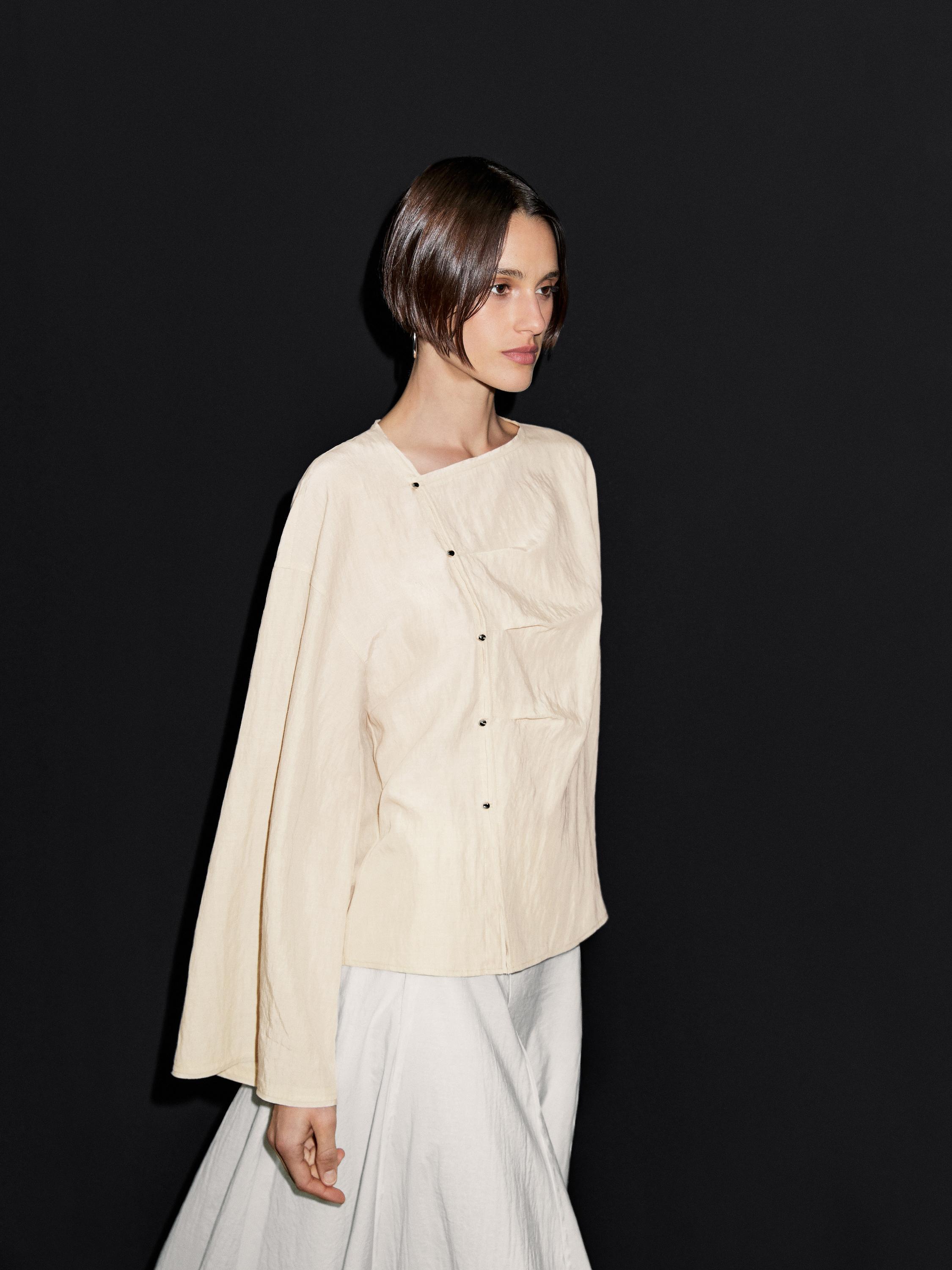 Blusa manga larga botonadura lateral