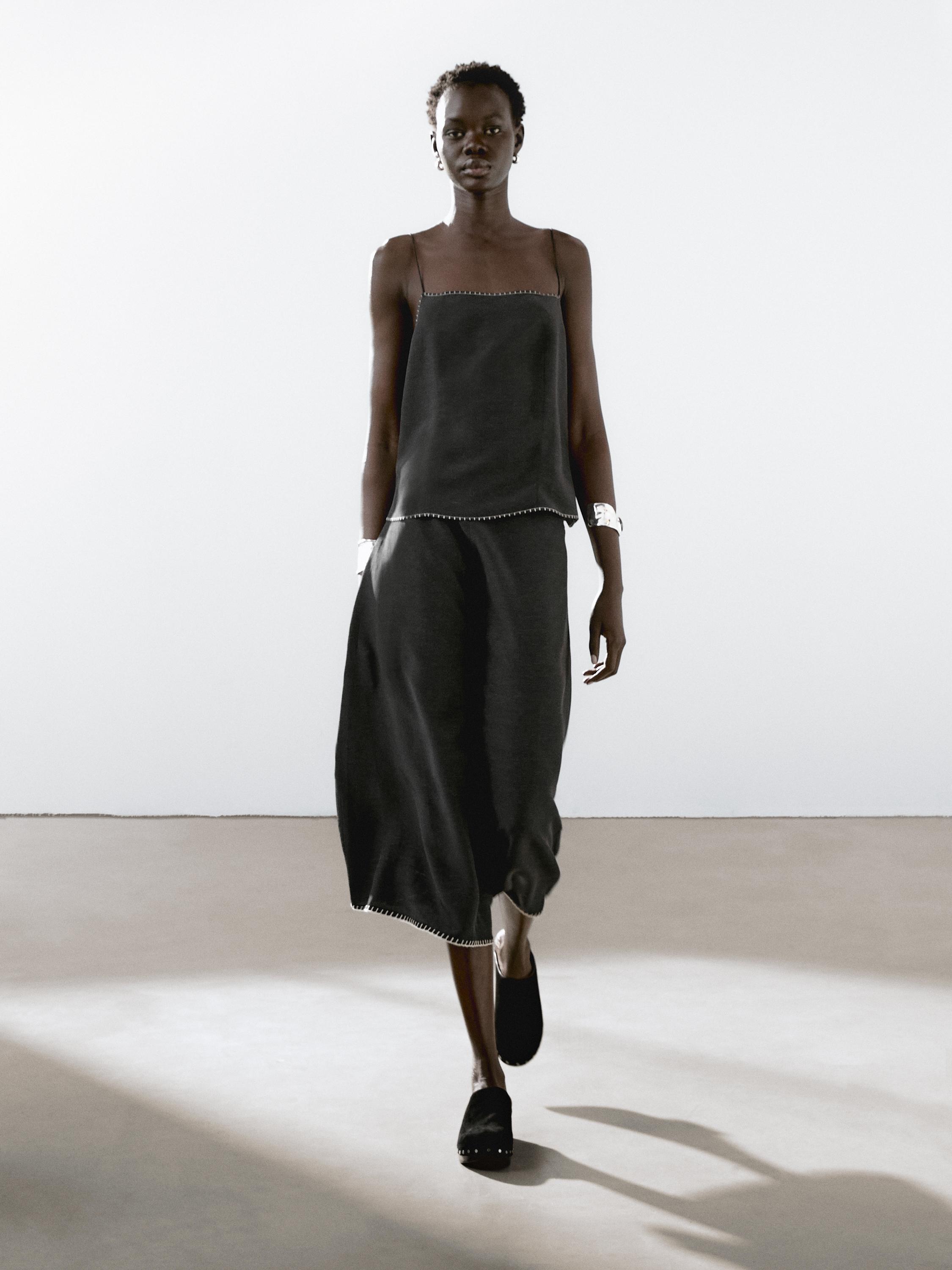 Strappy top with contrast topstitching