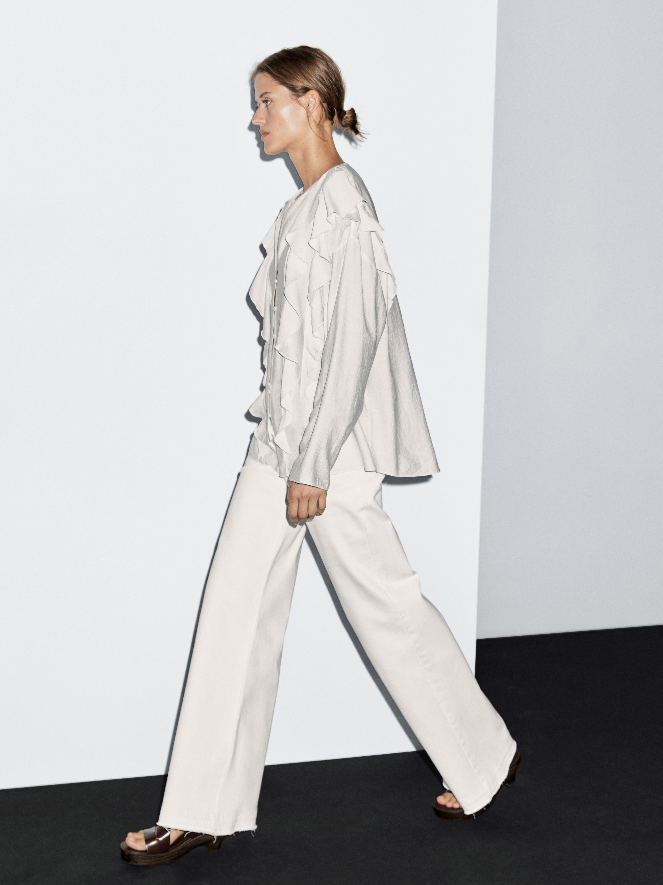Flowing blouse with ruffles