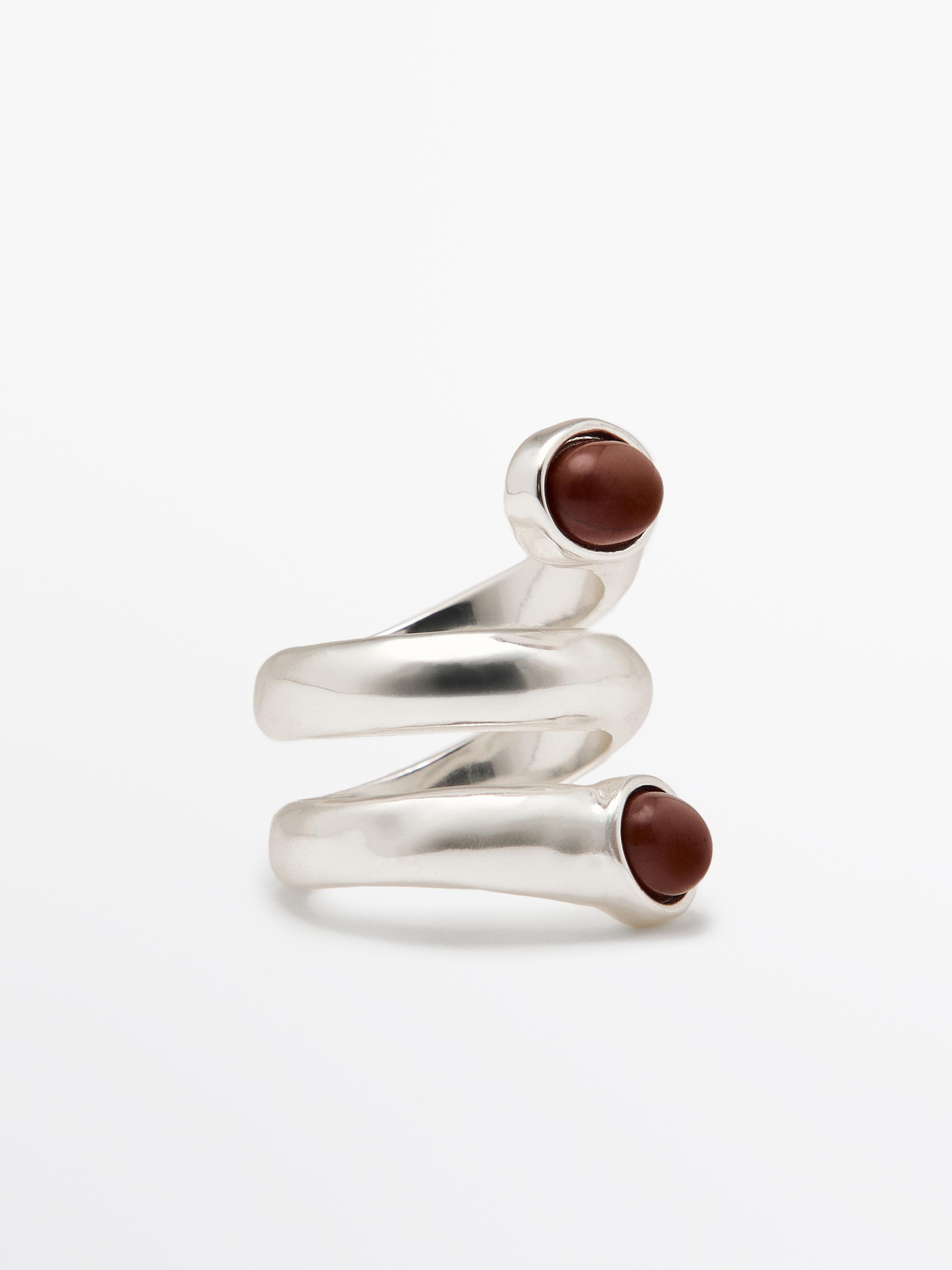 Spiral ring with encrusted details