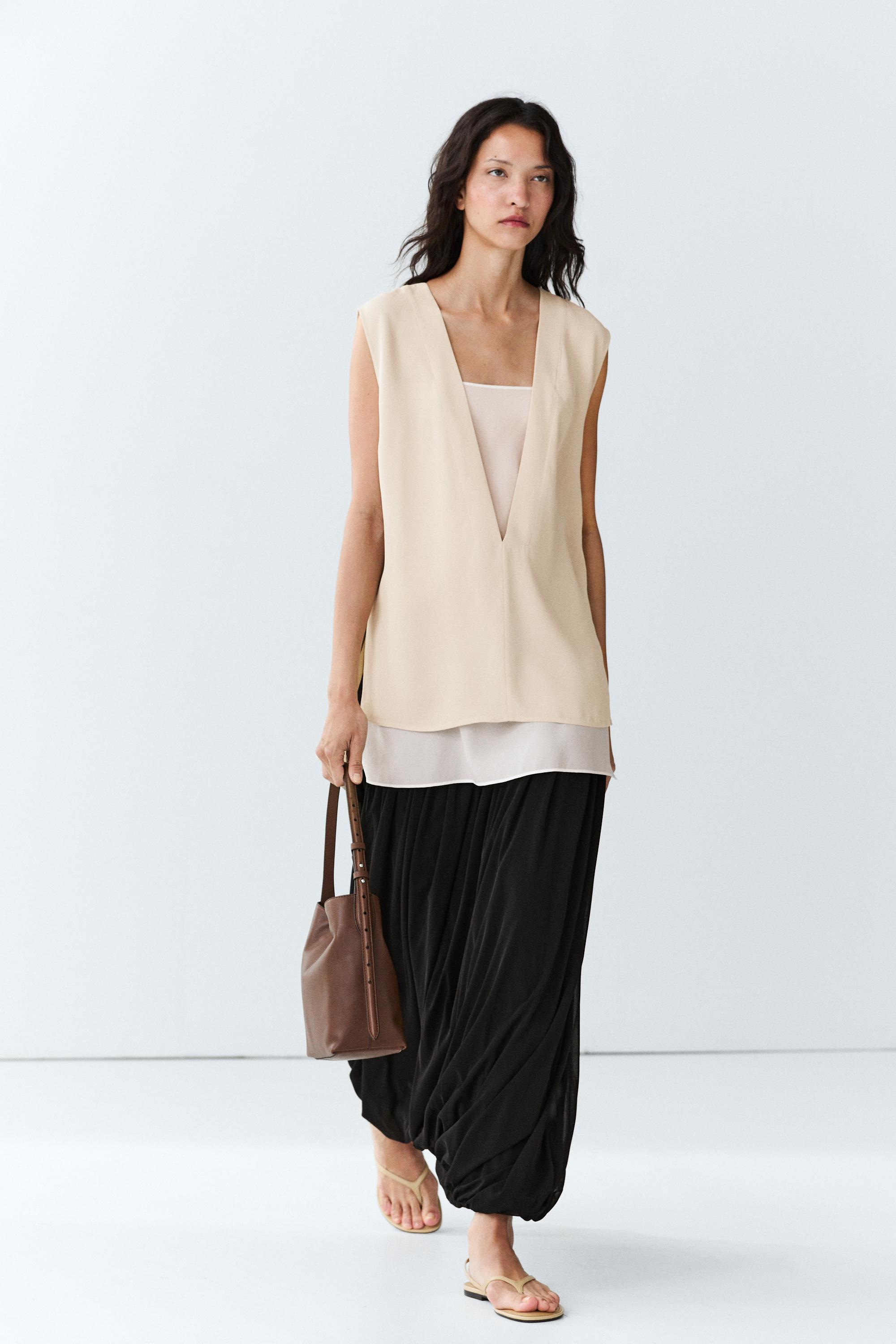 Flowing double-layer top with contrast detail — CREAM