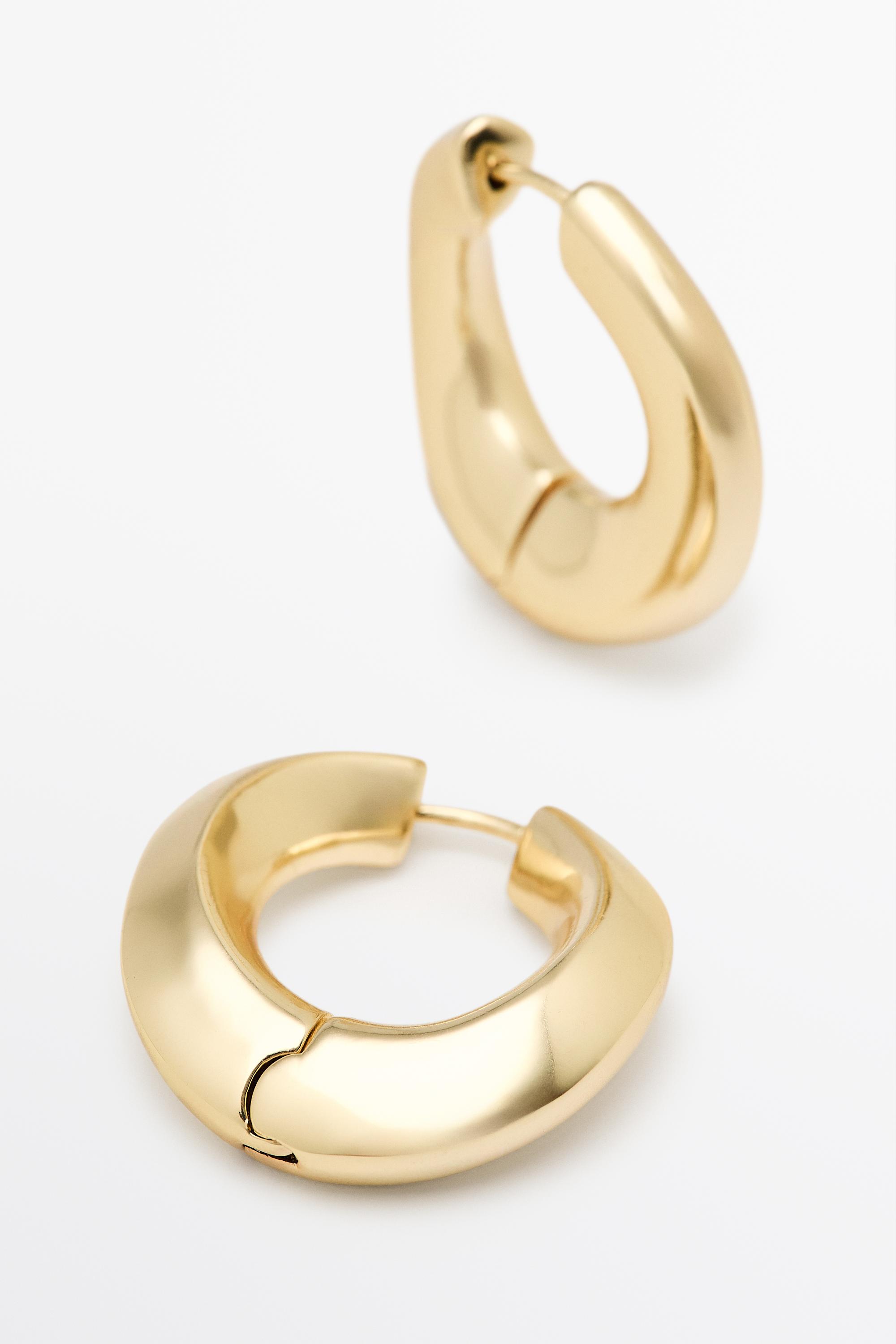 Voluminous hoop earrings — GOLDEN