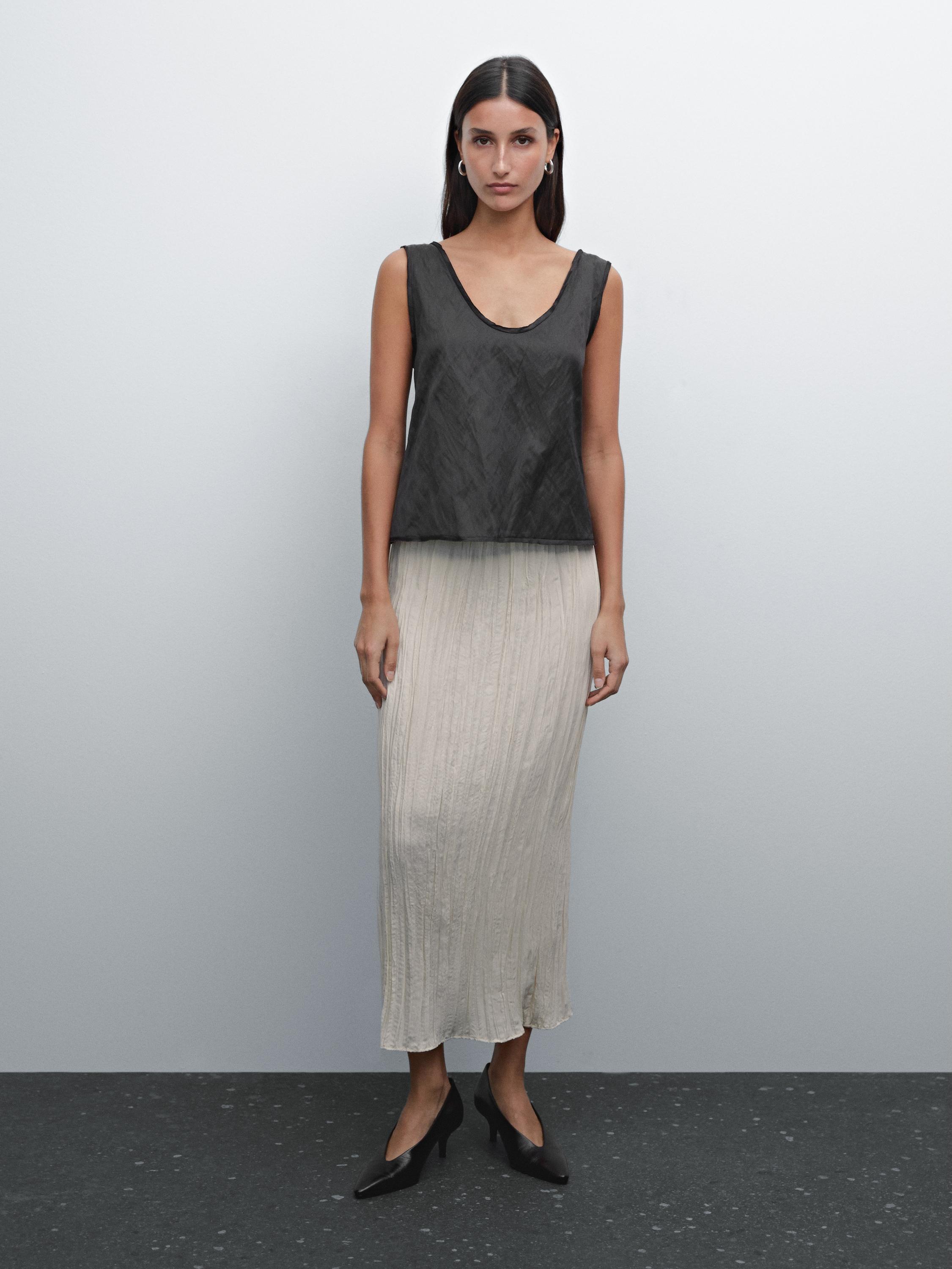 Flowing pleated midi skirt