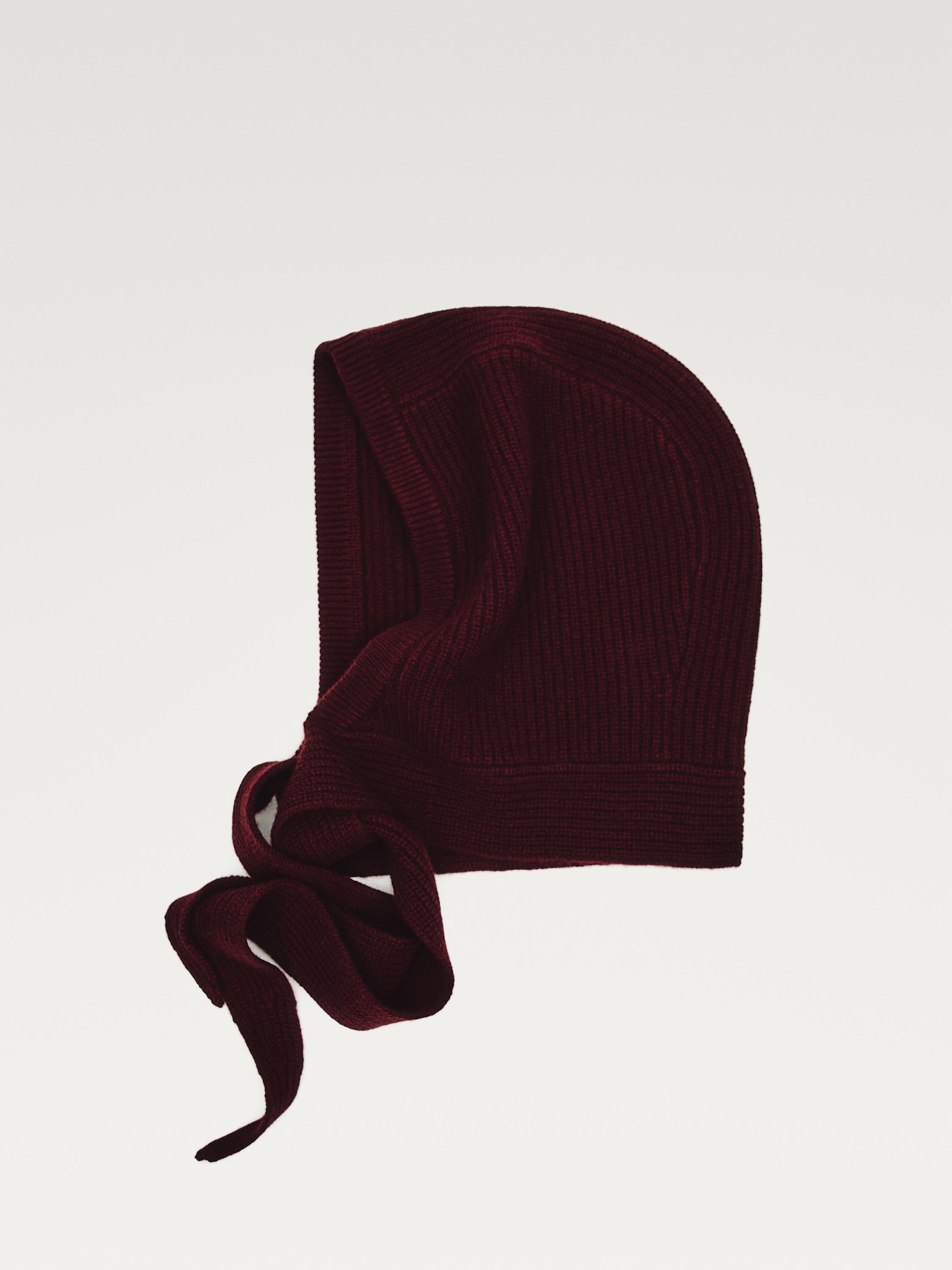 Knit hood with tie