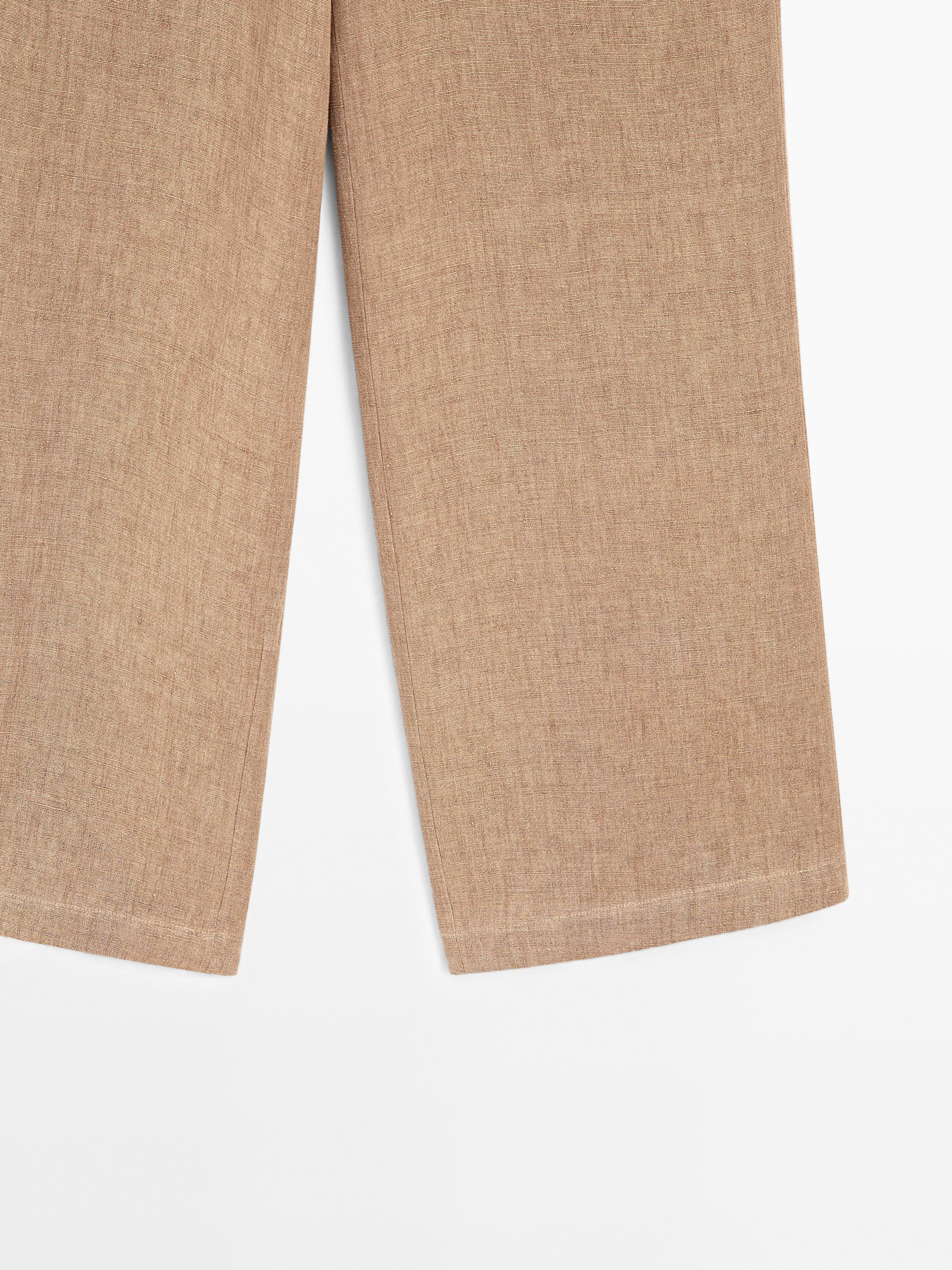 Linen suit trousers with frayed detail