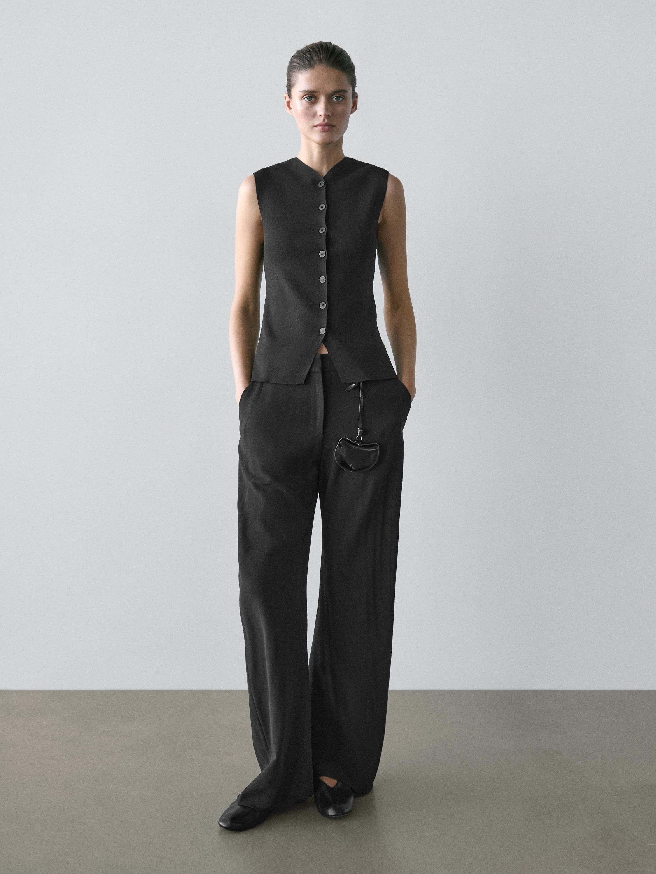 V-neck vest with button details — BLACK