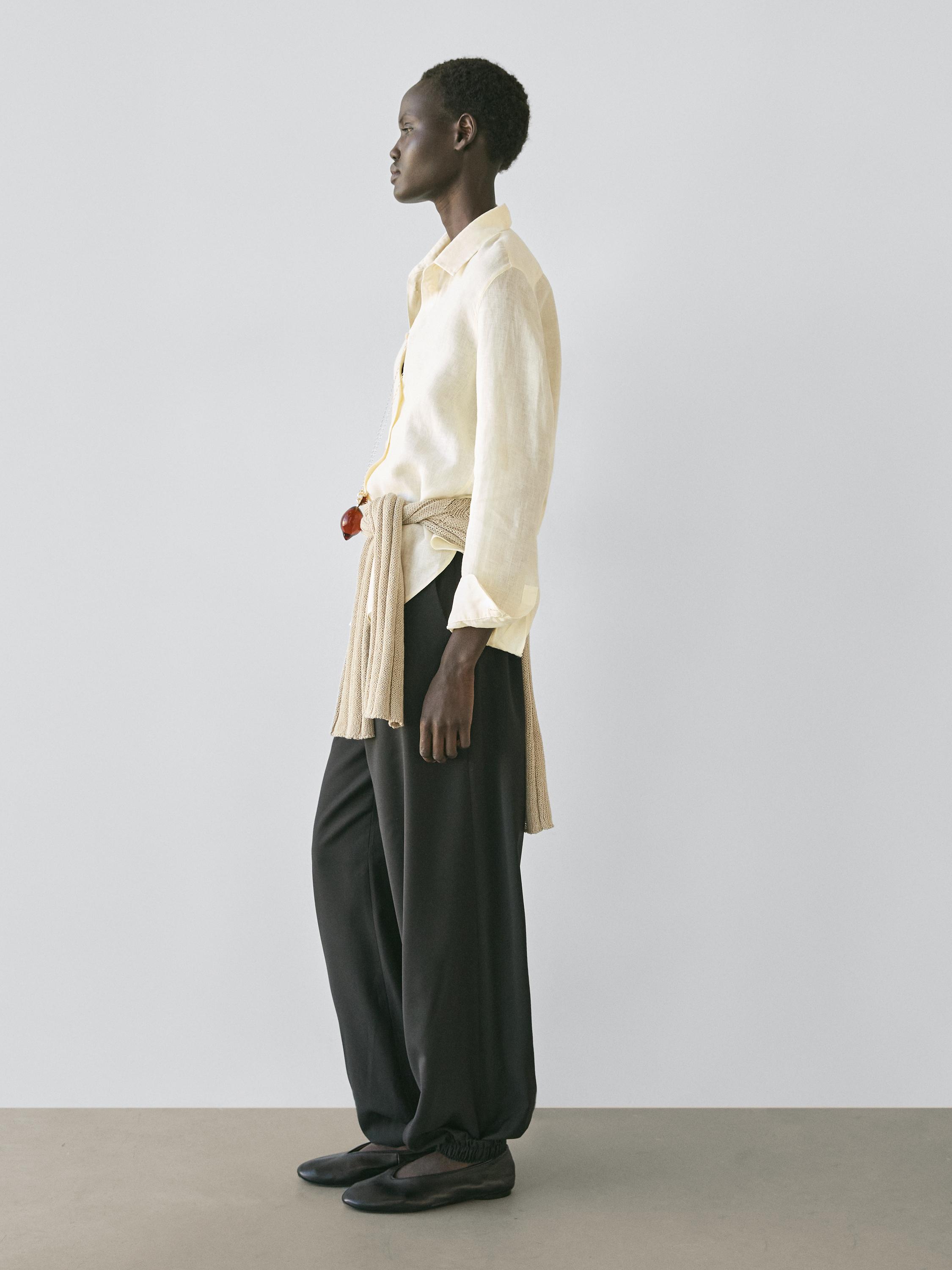 Wool sarouel trousers with tie detail — BLACK