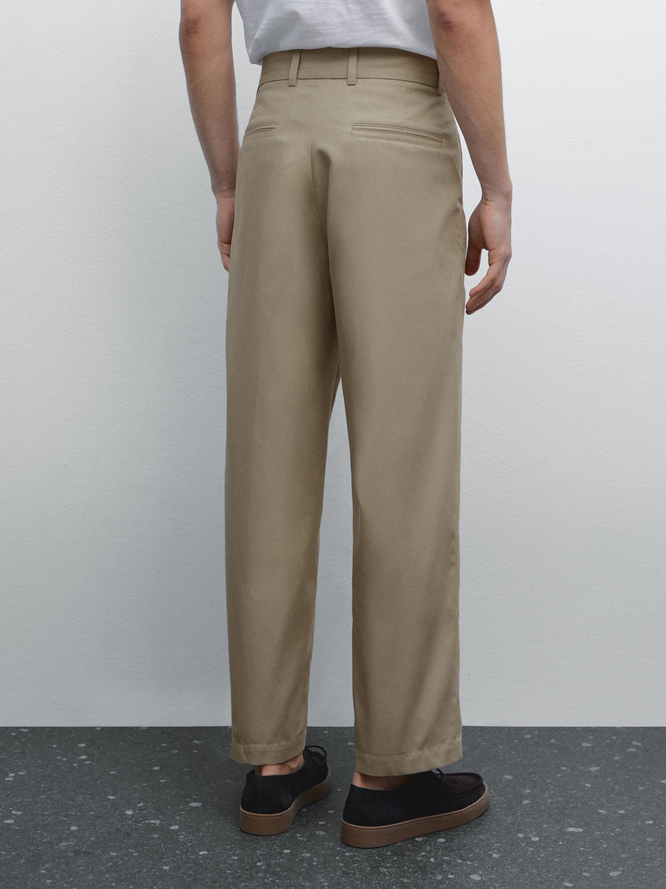 Pantalón relaxed fit detalle pinza