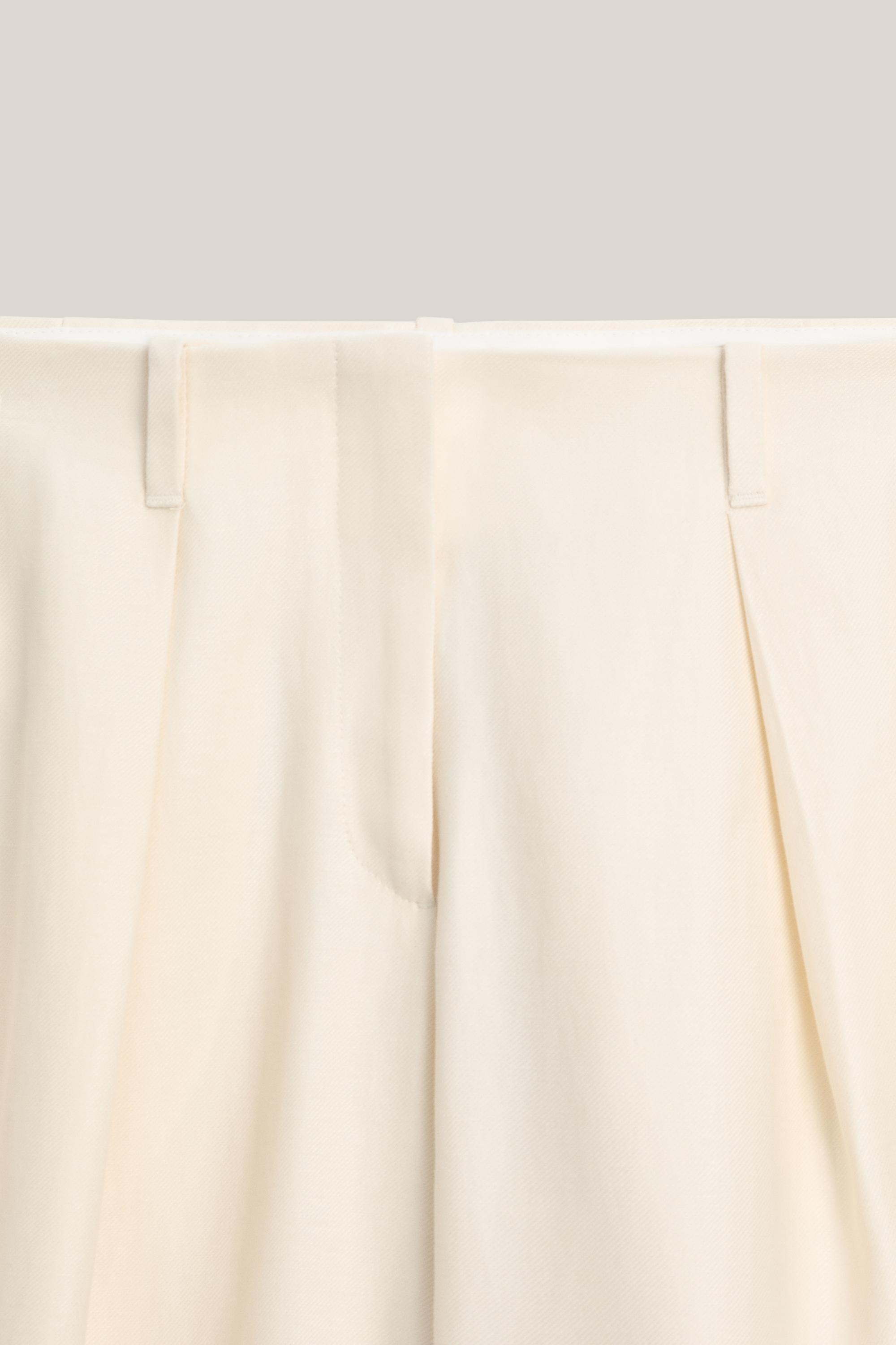 Wide-leg trousers with pleated details - LIMITED EDITION — Off white