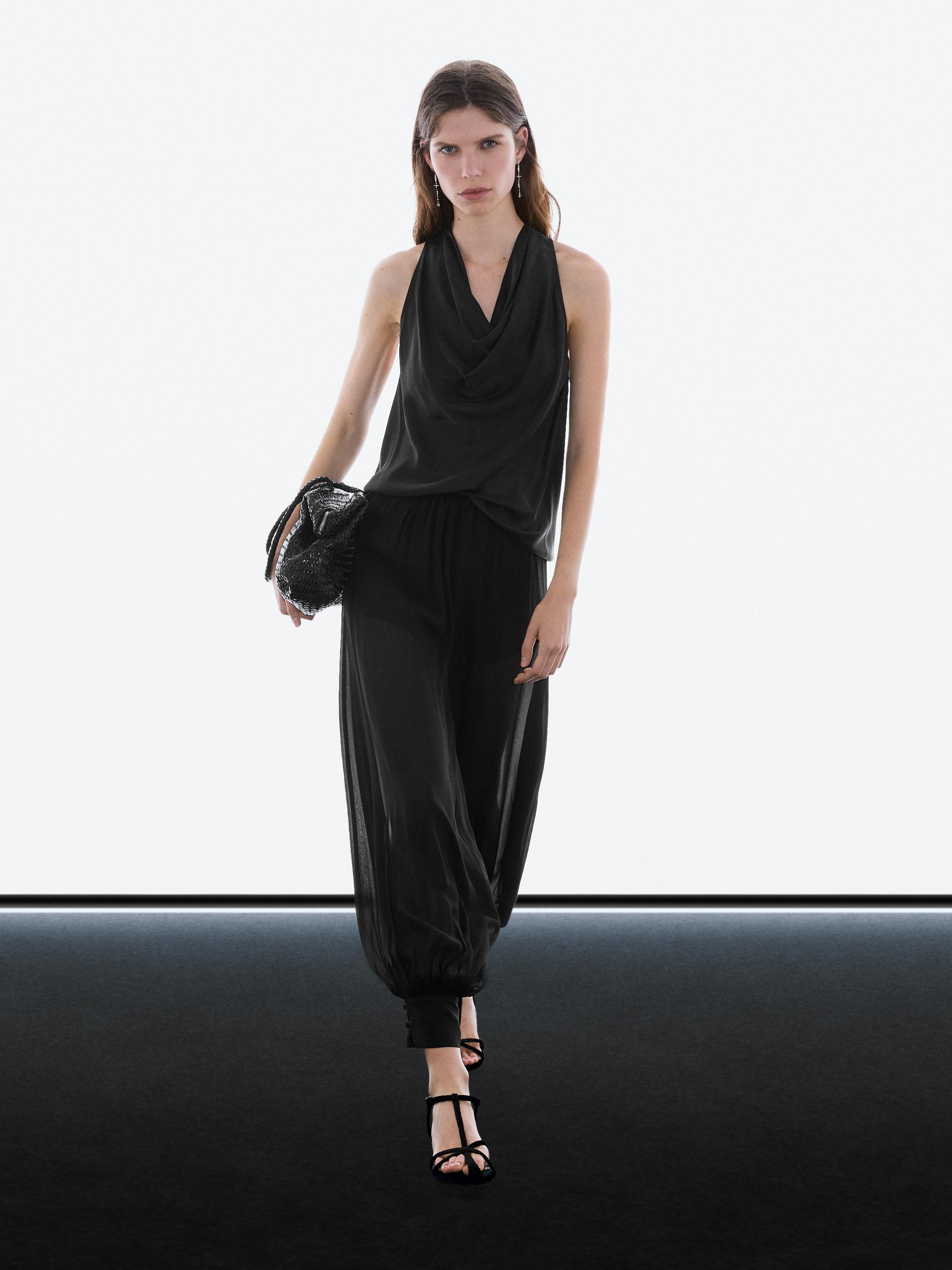 Semi-sheer sarouel trousers with button details — BLACK