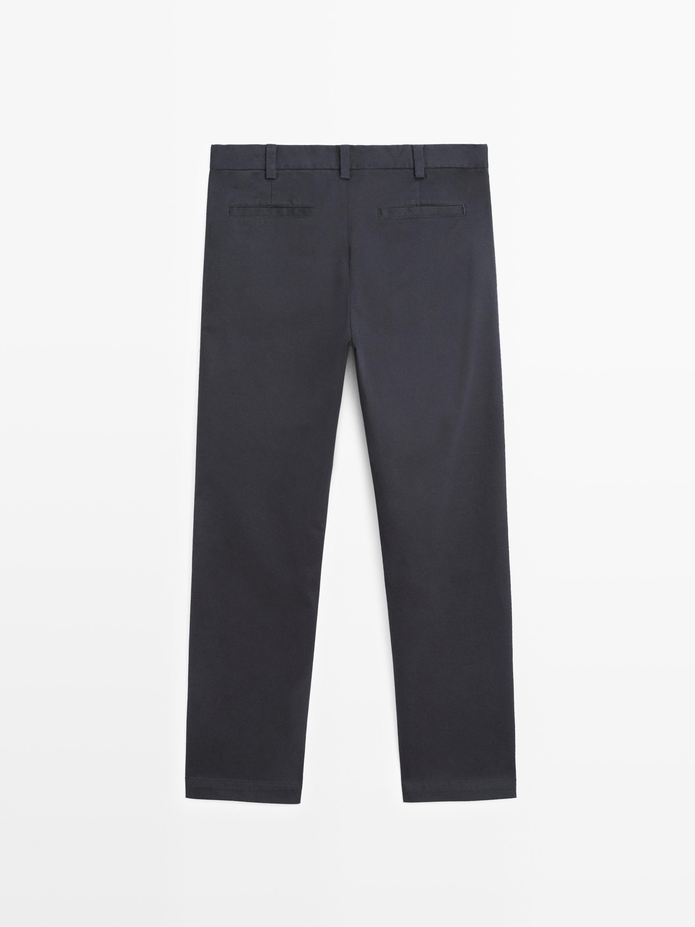 Tapered fit micro textured trousers — NAVY BLUE