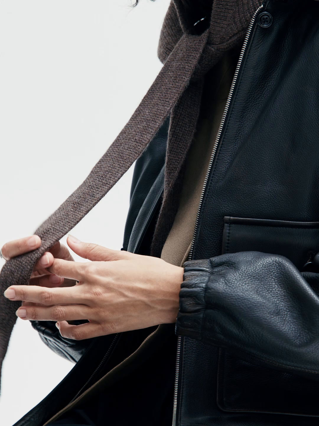 Knit hood with tie