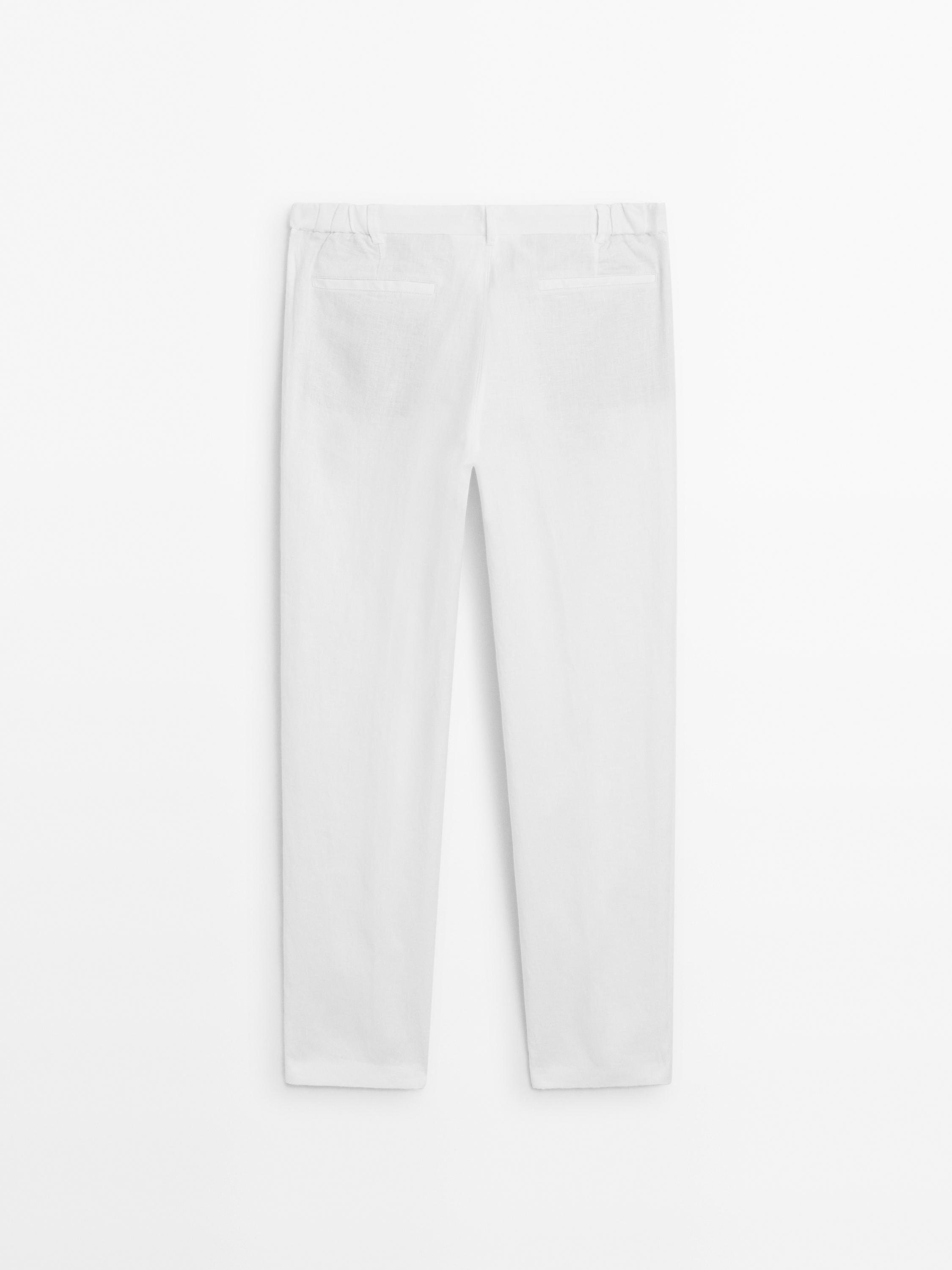 Pantalón tapered fit 100% lino