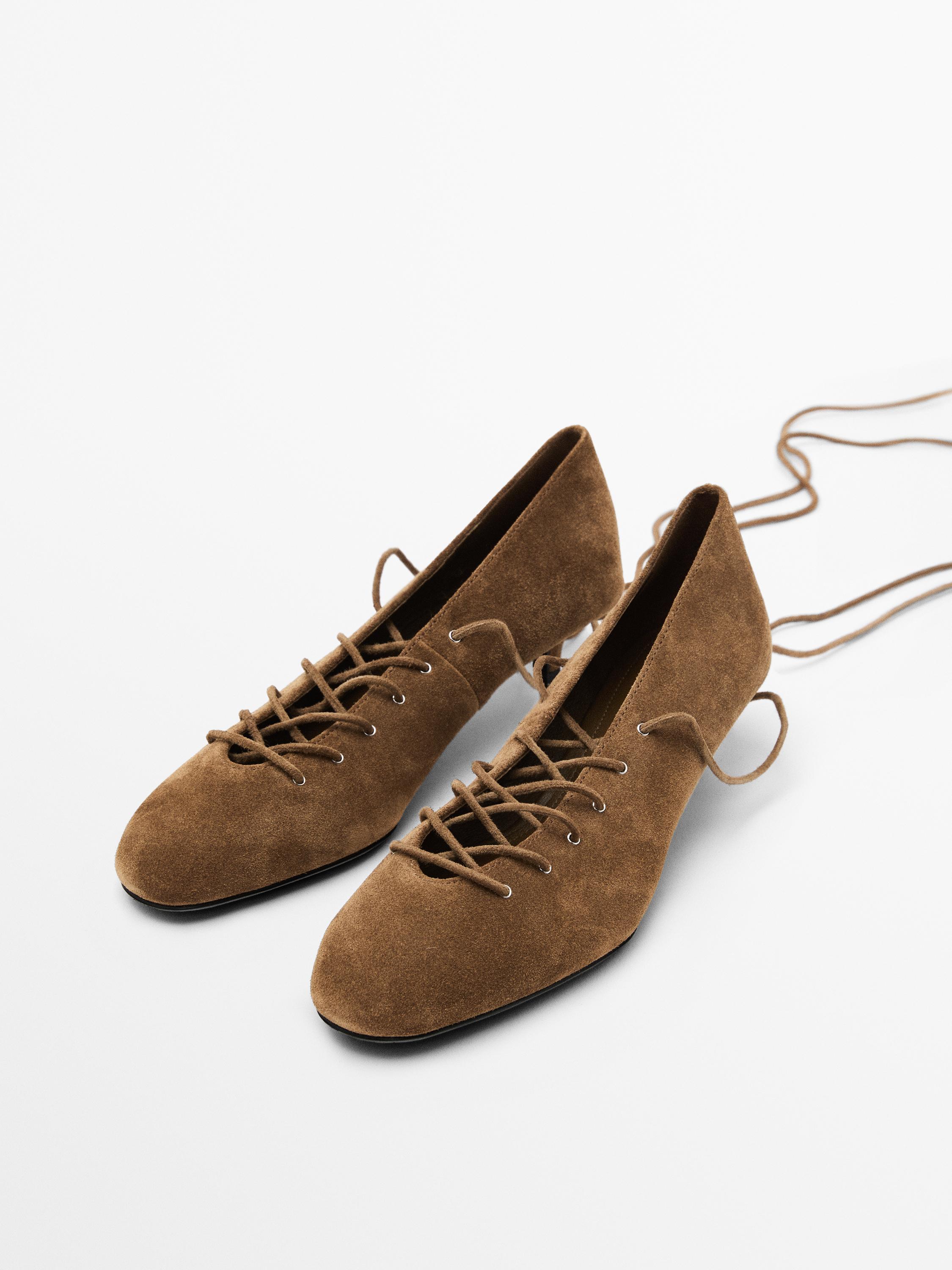 Lace-up high heel shoes