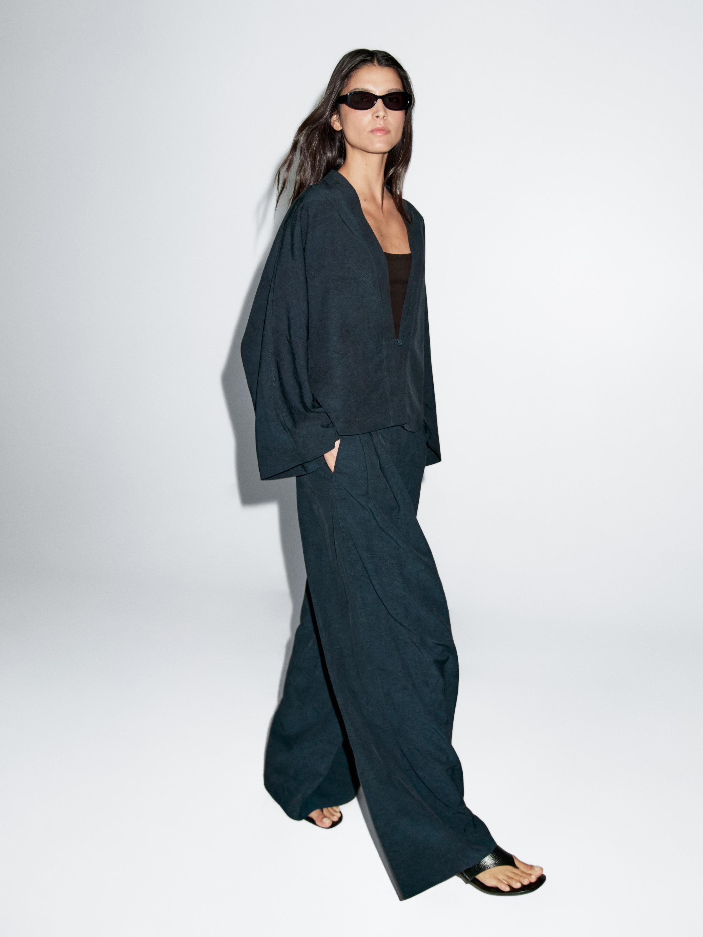 Flowing jacquard trousers with darts