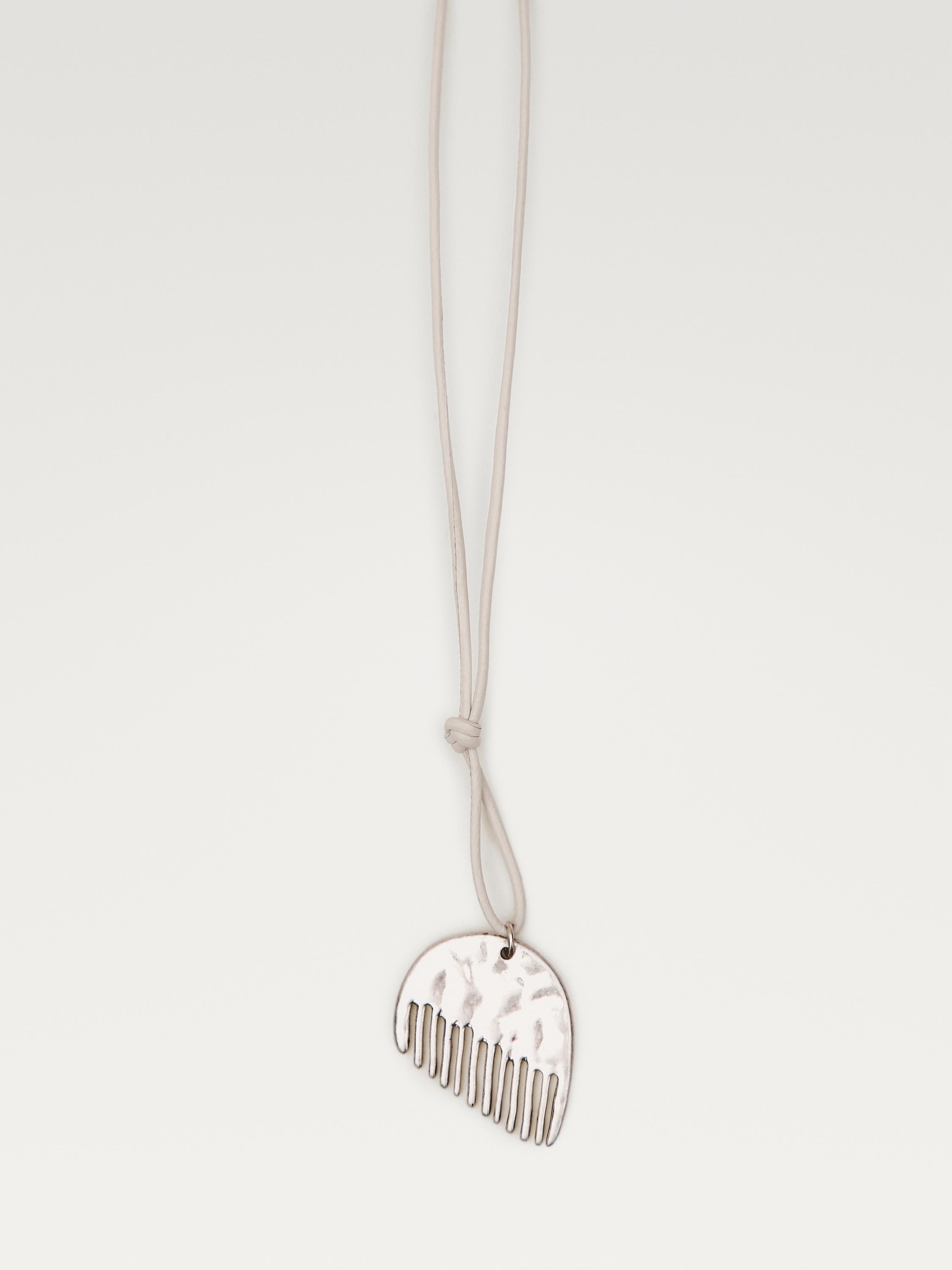 Cord necklace with comb piece