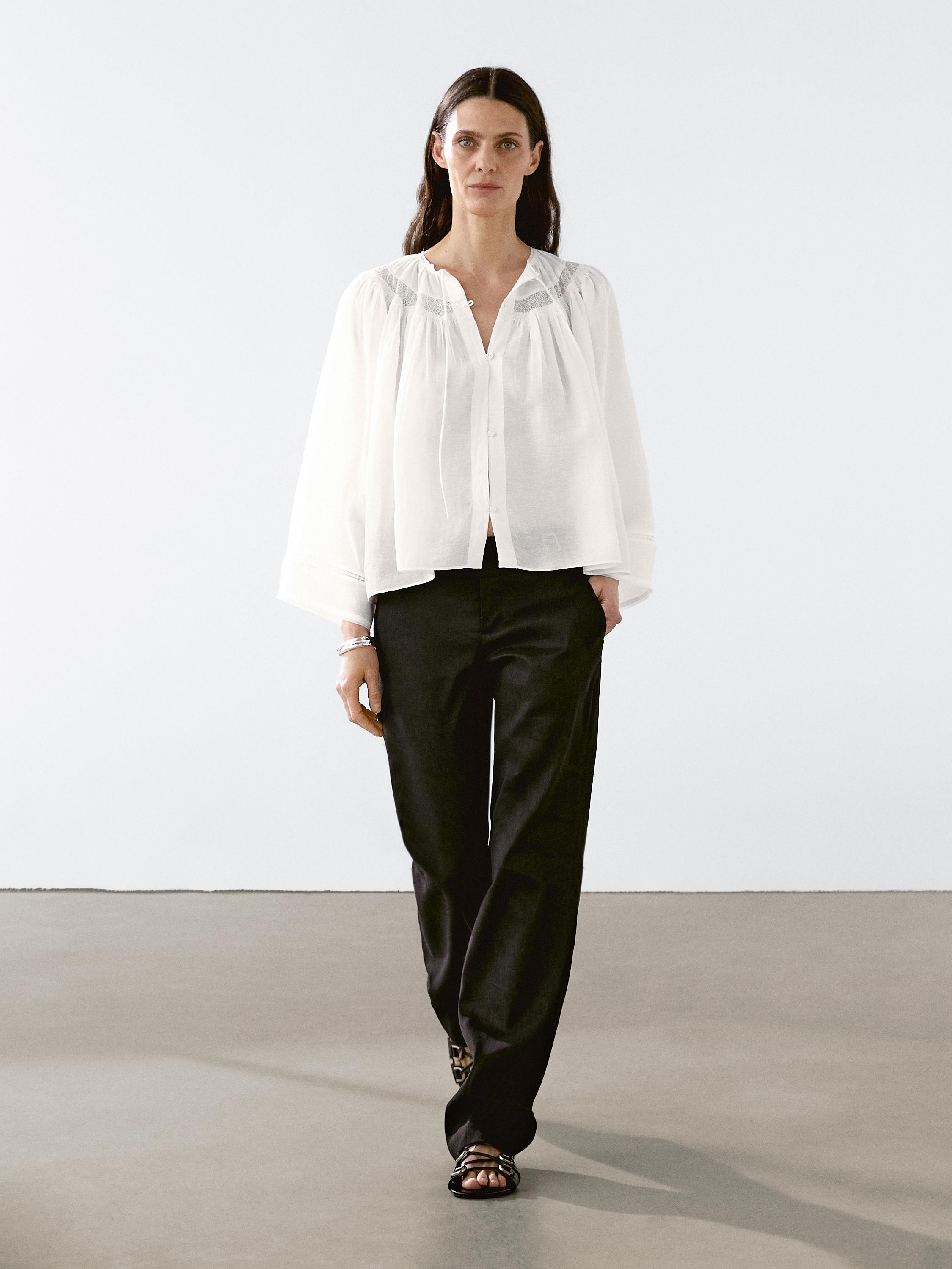 Blusa arina dentelaren xehetasunarekin