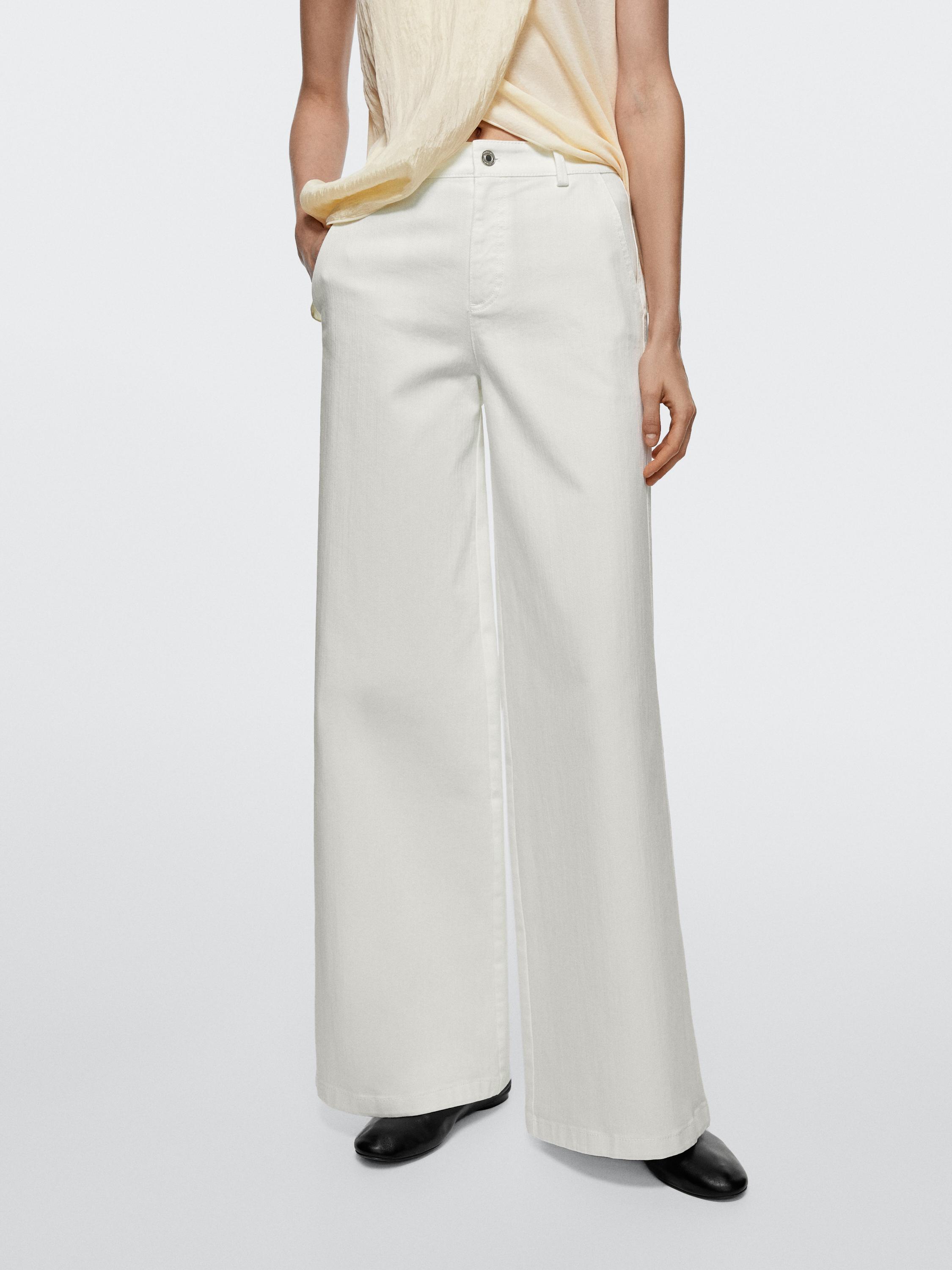 Pantallona të gjera në fund me brez të lartë