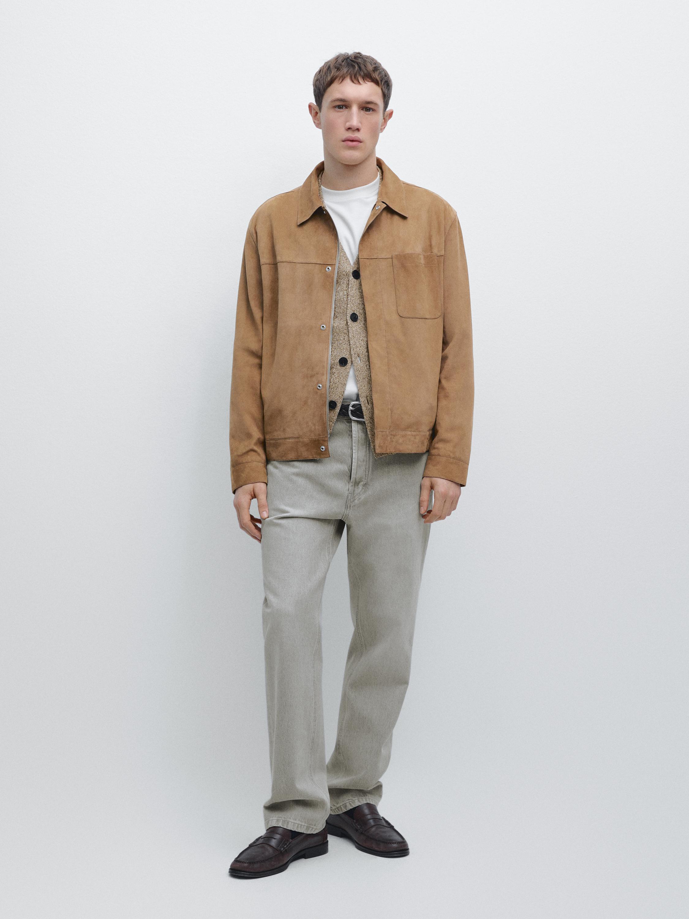 Mink jacket set with a top pocket, white t-shirt, beige cardigan, gray pants, and brown loafers.