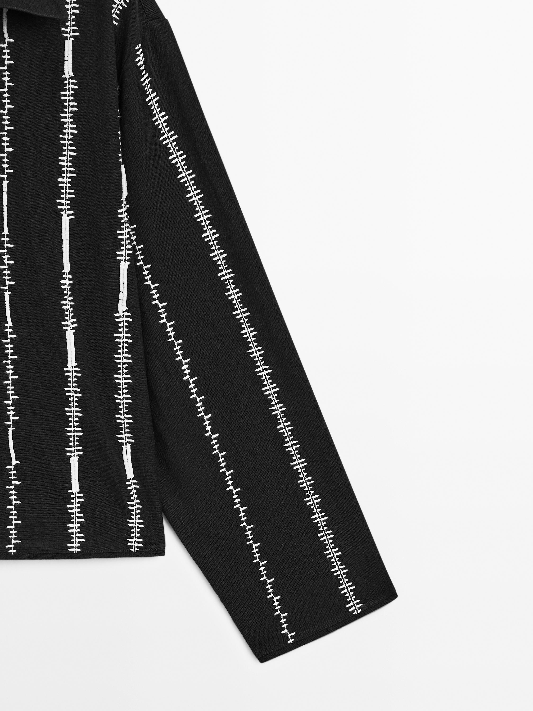 Blouse with embroidered details