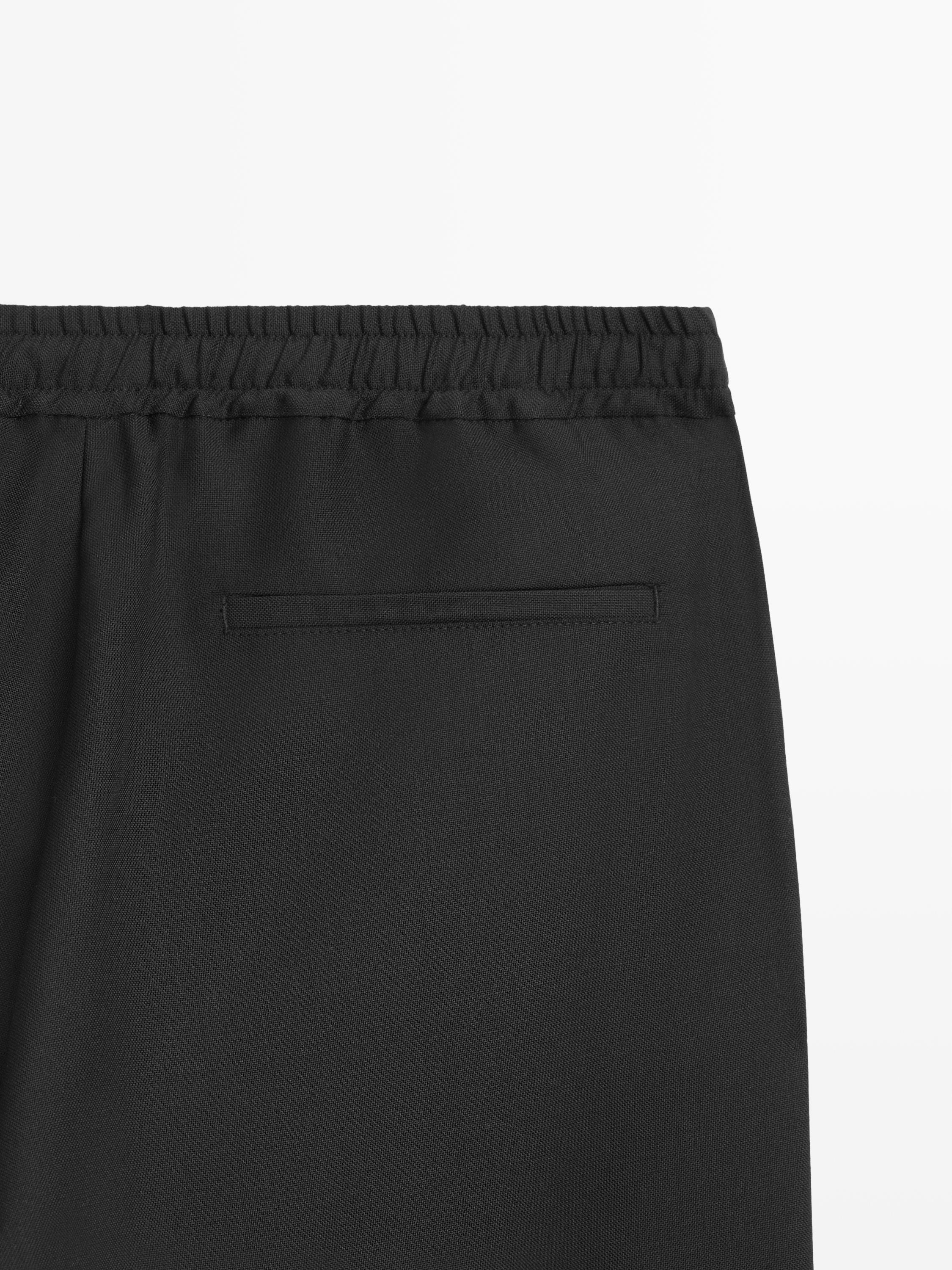 Relaxed fit 100% wool trousers — BLACK