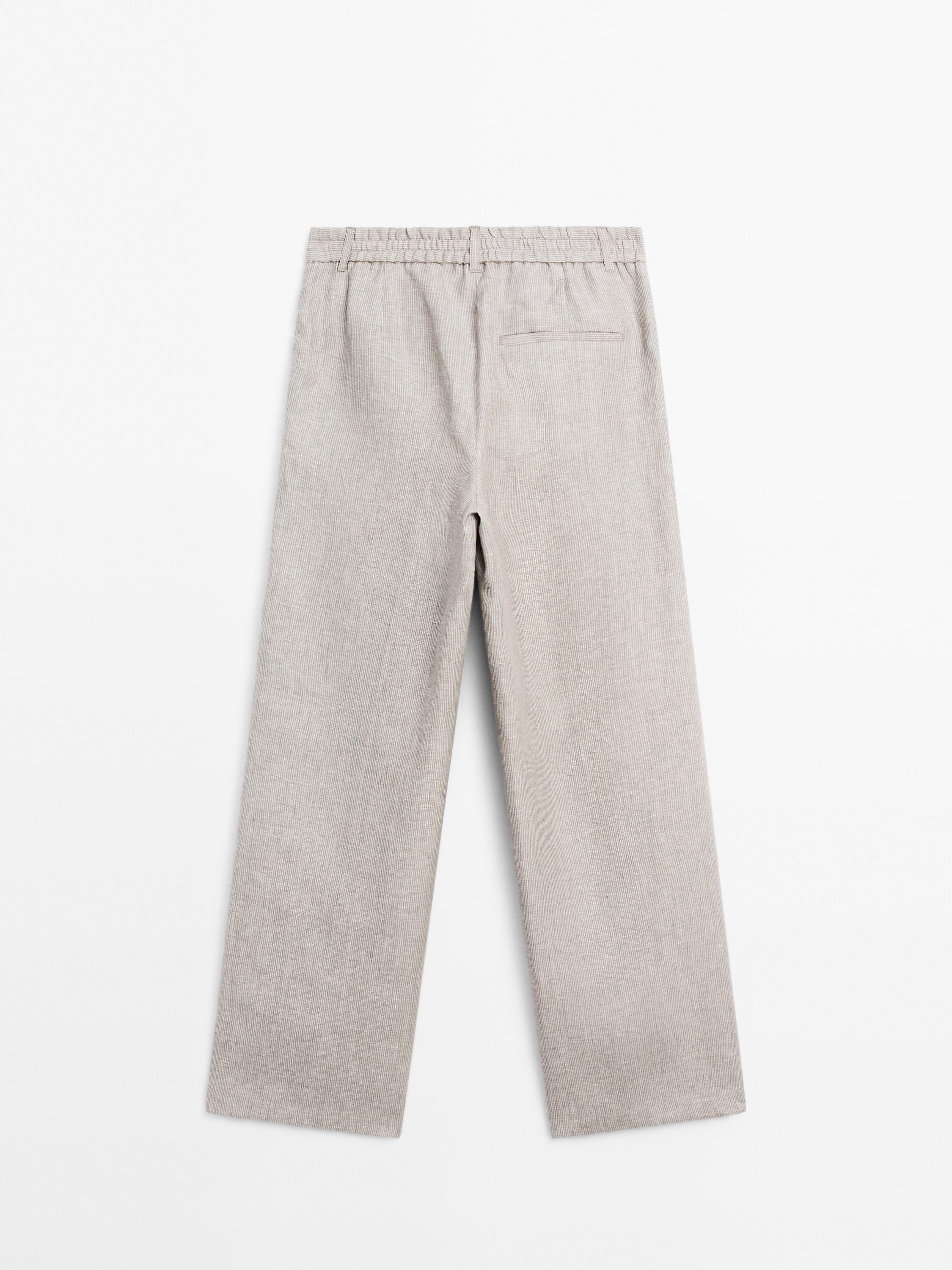 Pinstriped wide-leg linen trousers