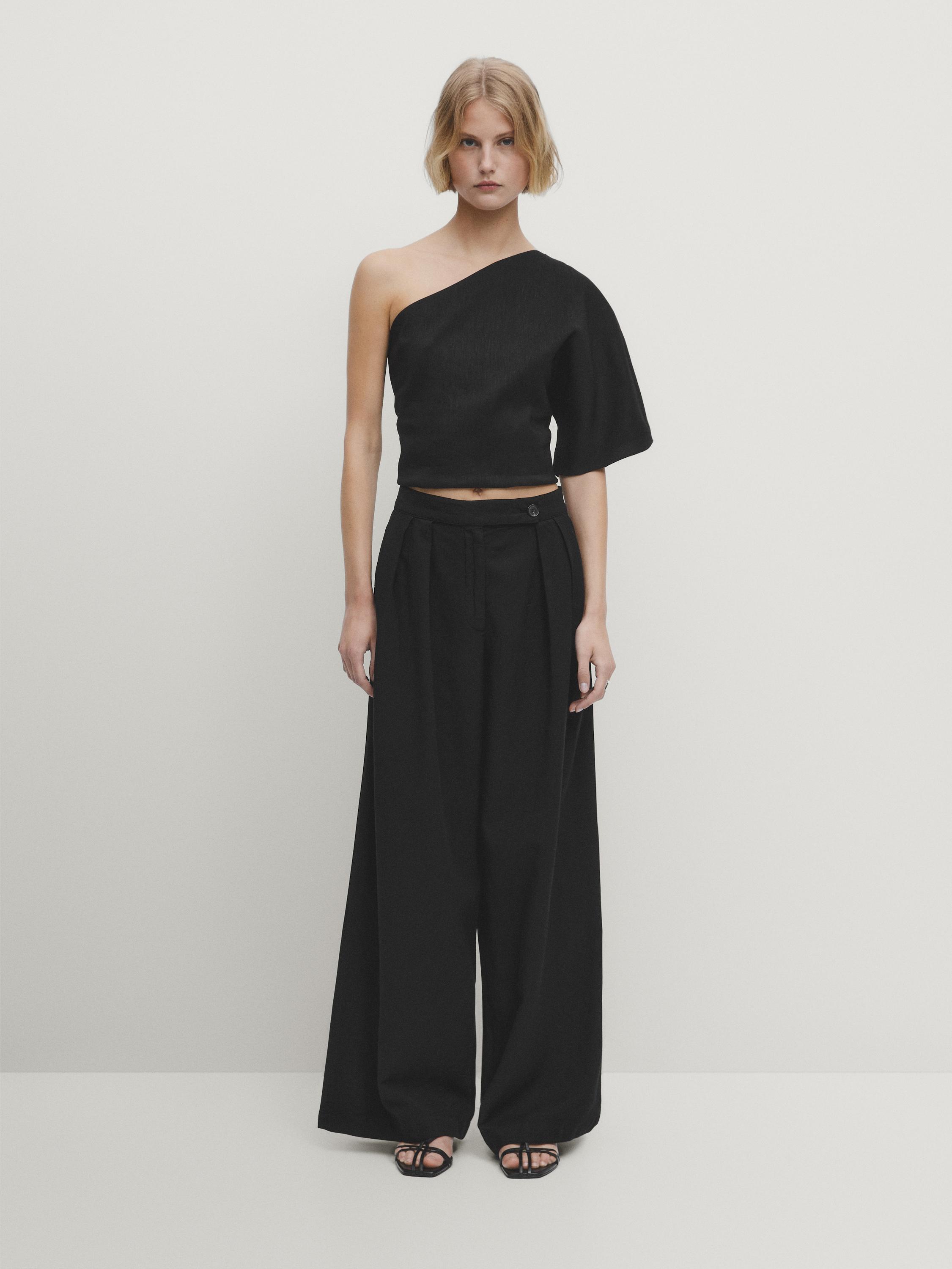 Wide-leg trousers with pleated details