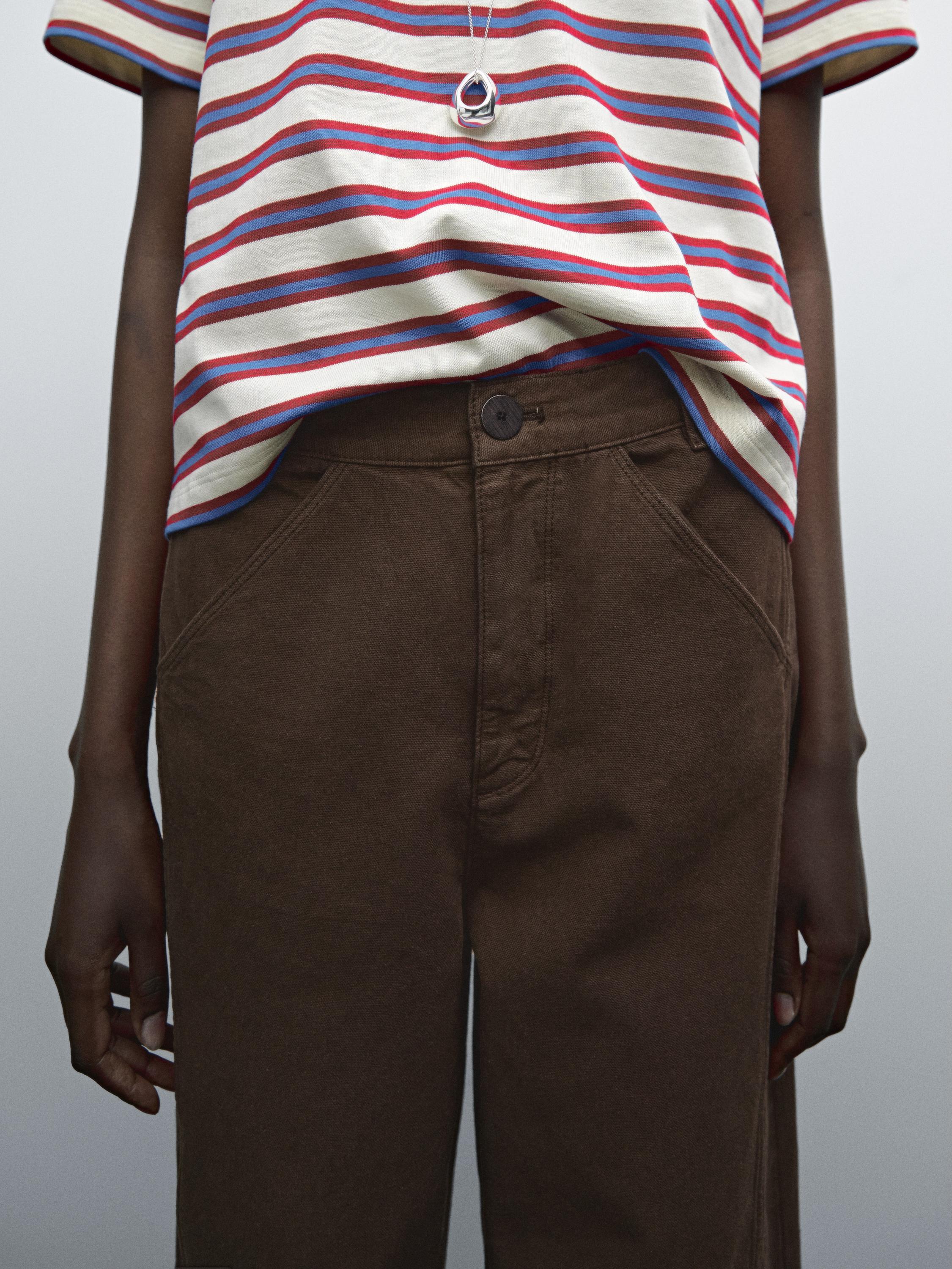 Pantalon jean avec coutures apparentes