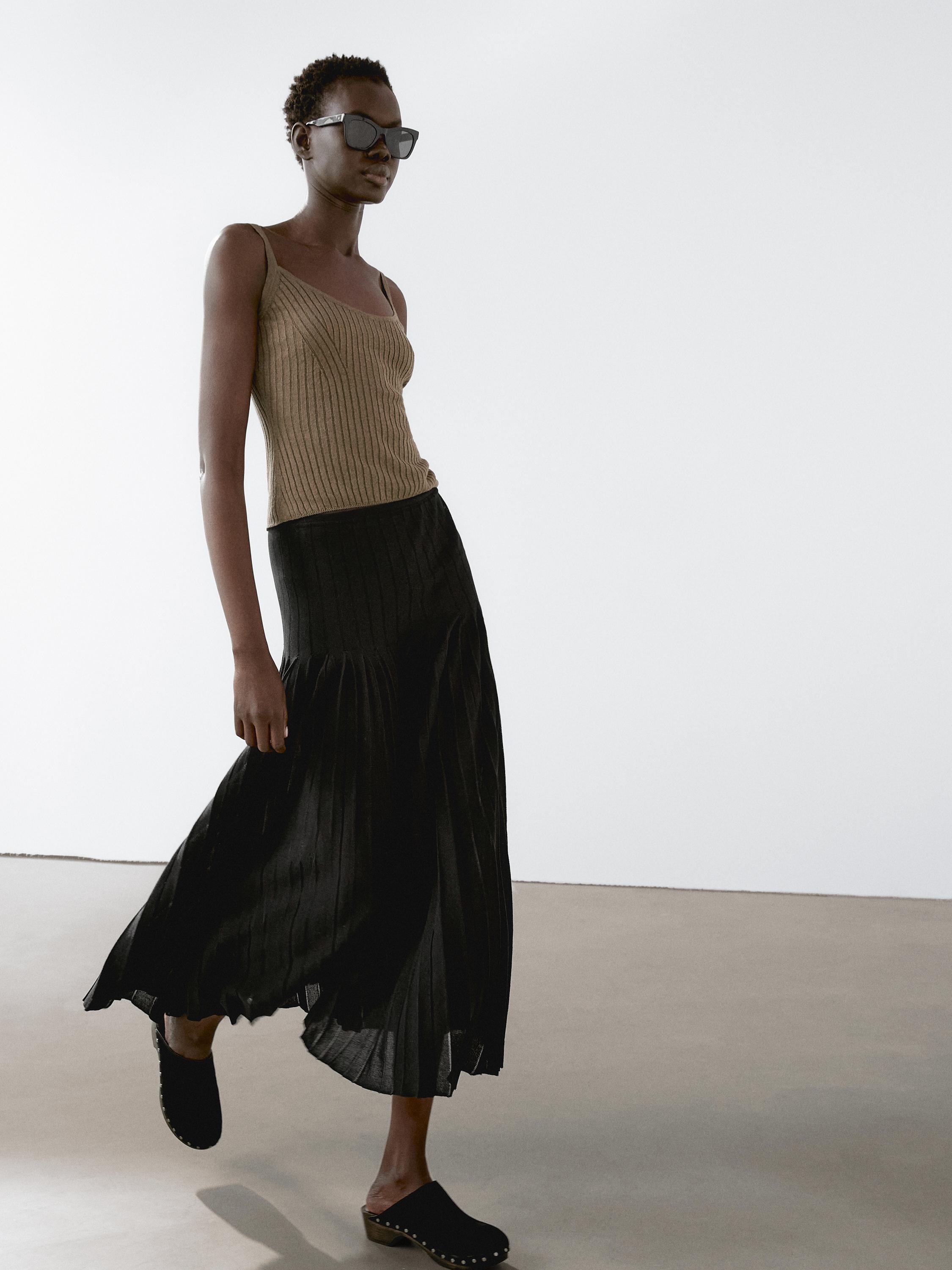 Pleated midi skirt with sheer details