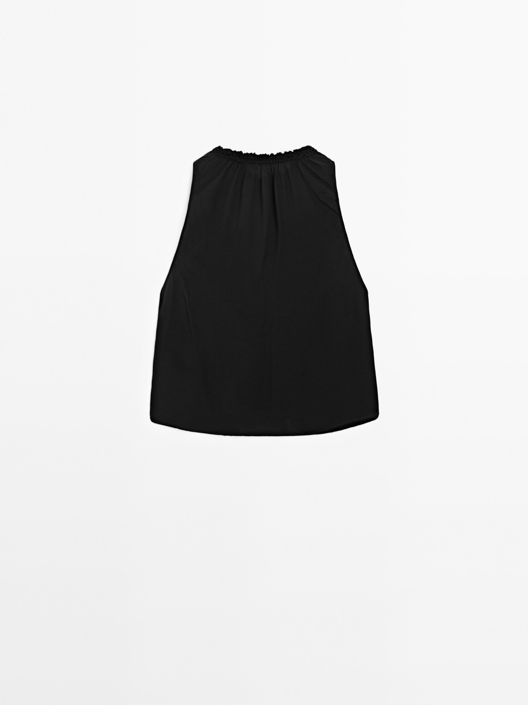 Flowing halter top with gathered detail