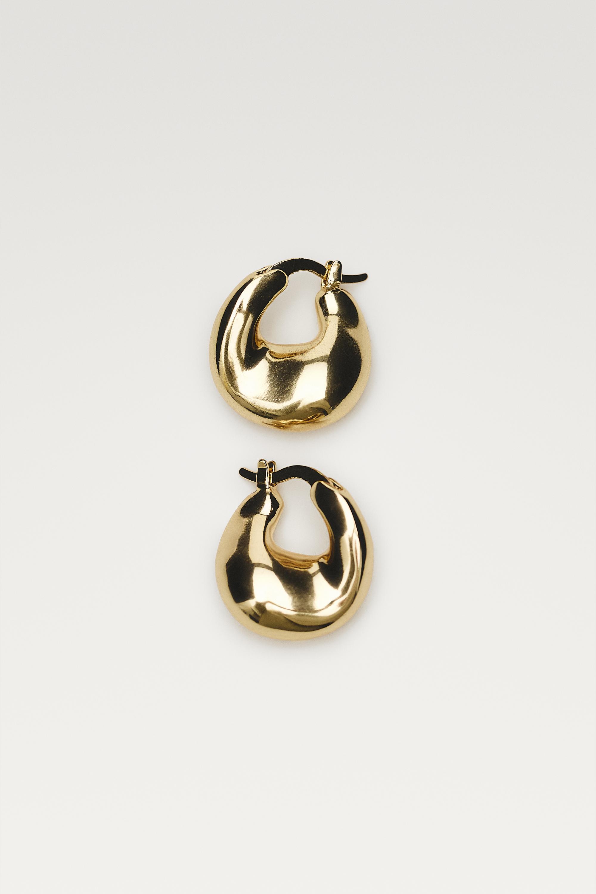 Voluminous hoop earrings — GOLDEN