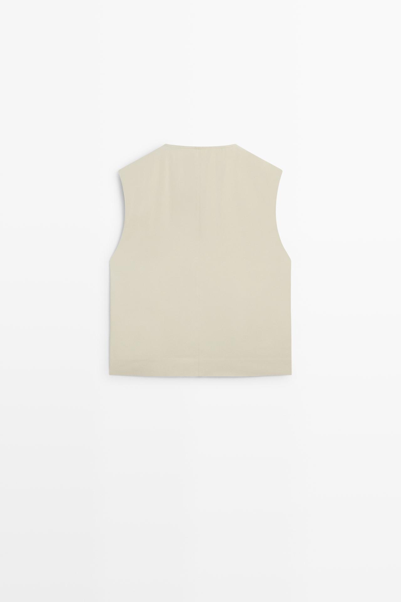 Flowing vest with asymmetric button closure — Beige