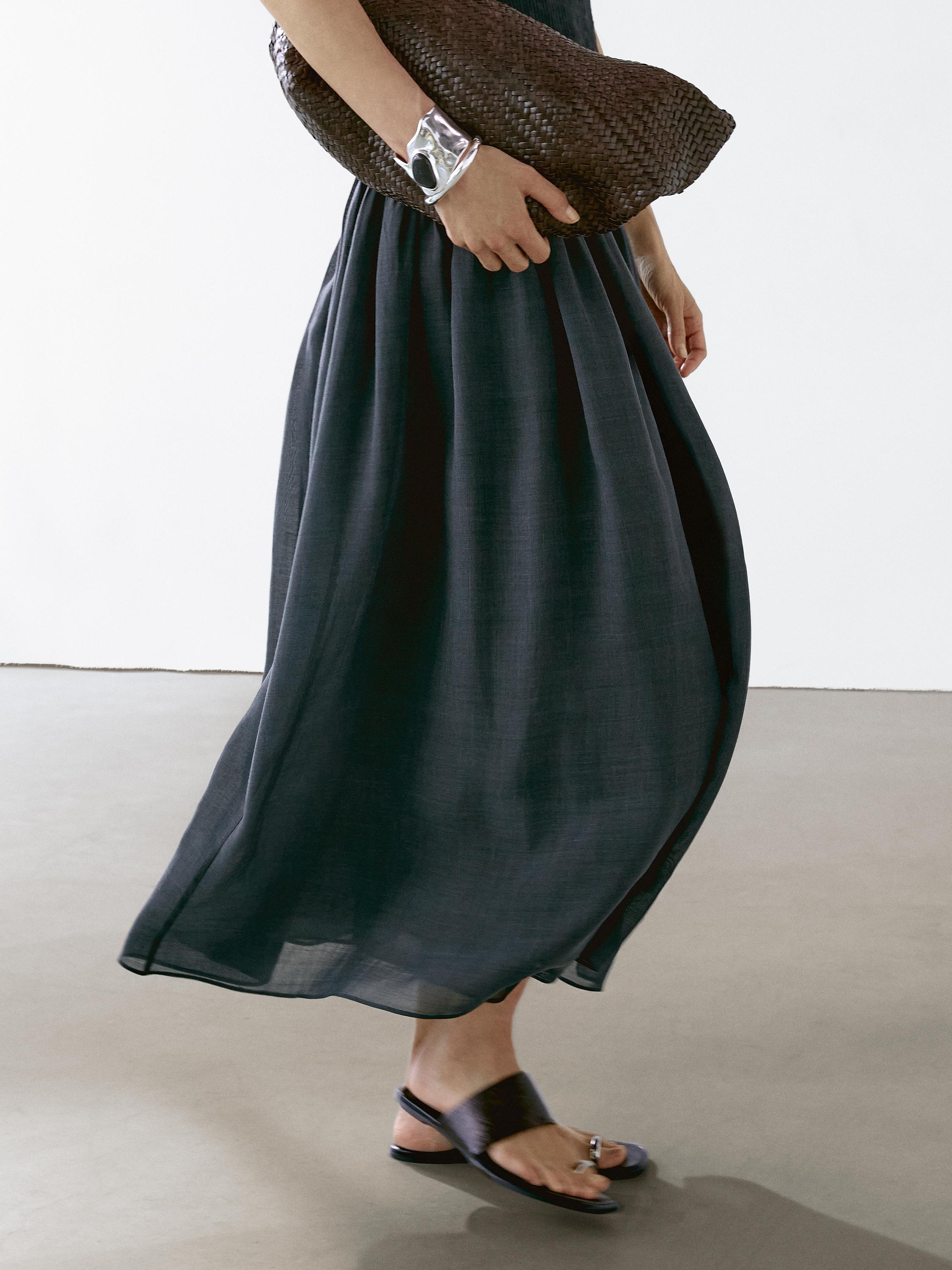 Long flounce dress with pintucks