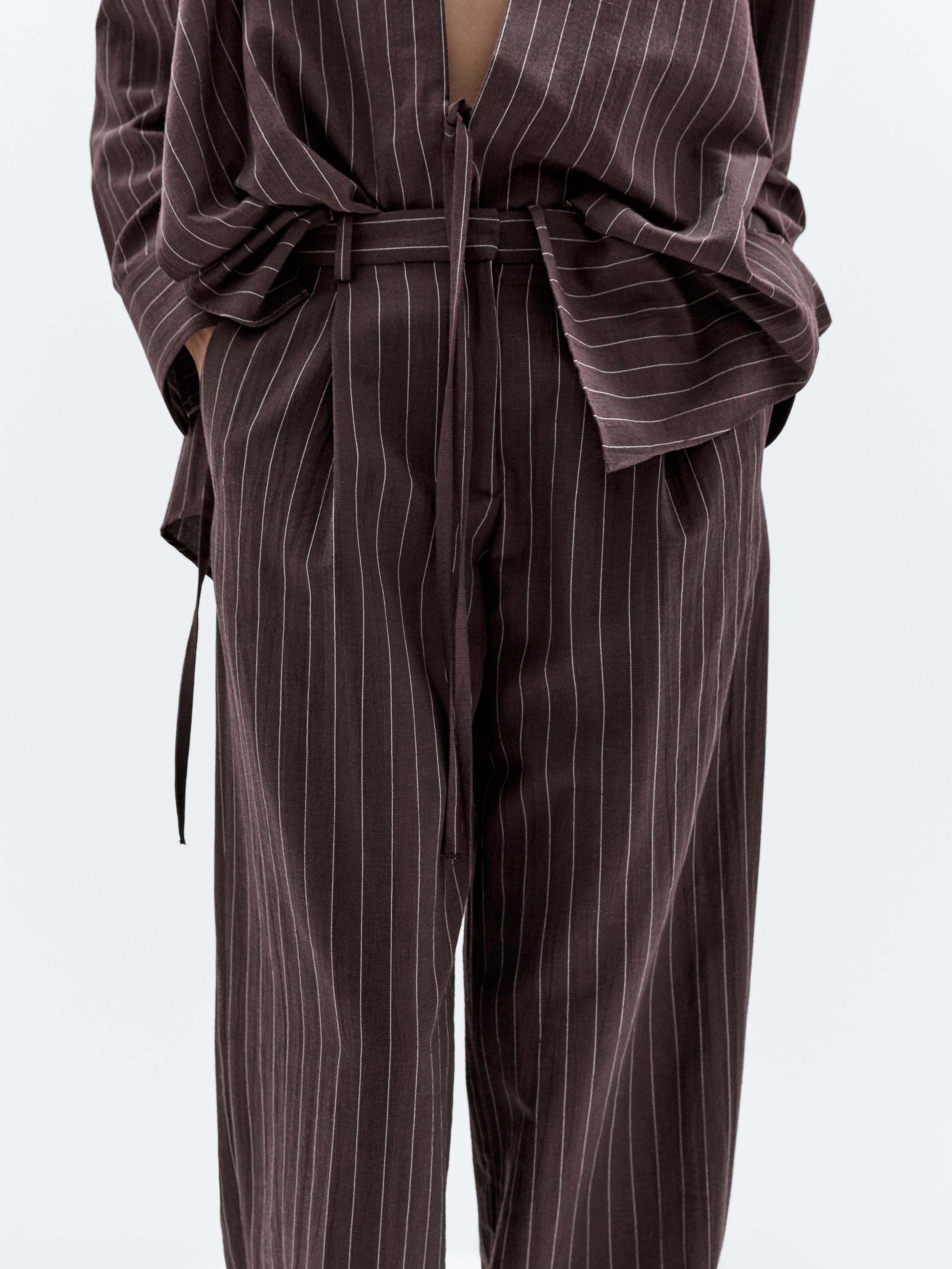 Darted pinstripe trousers