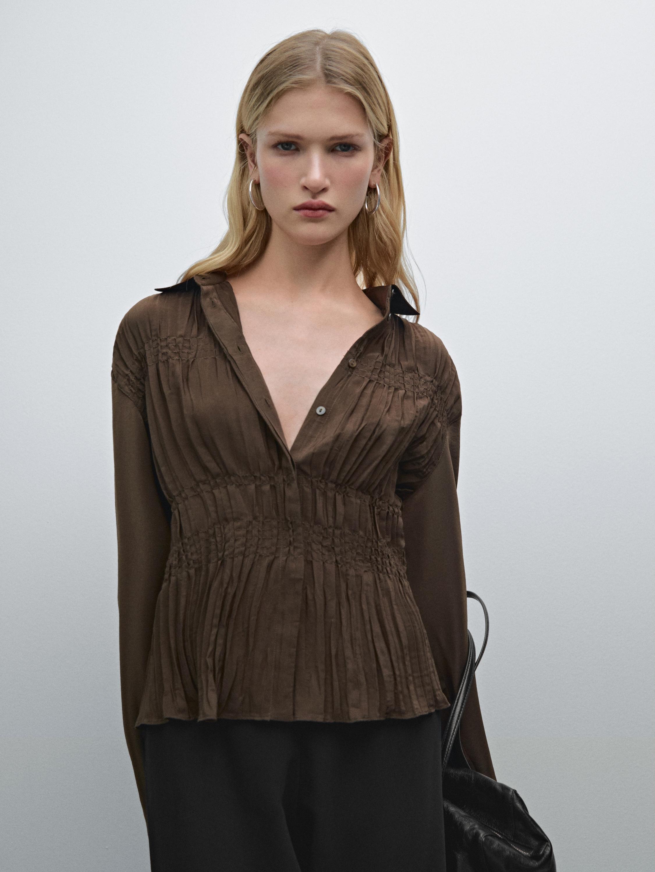 قميص فضفاض بتفاصيل بكشكش