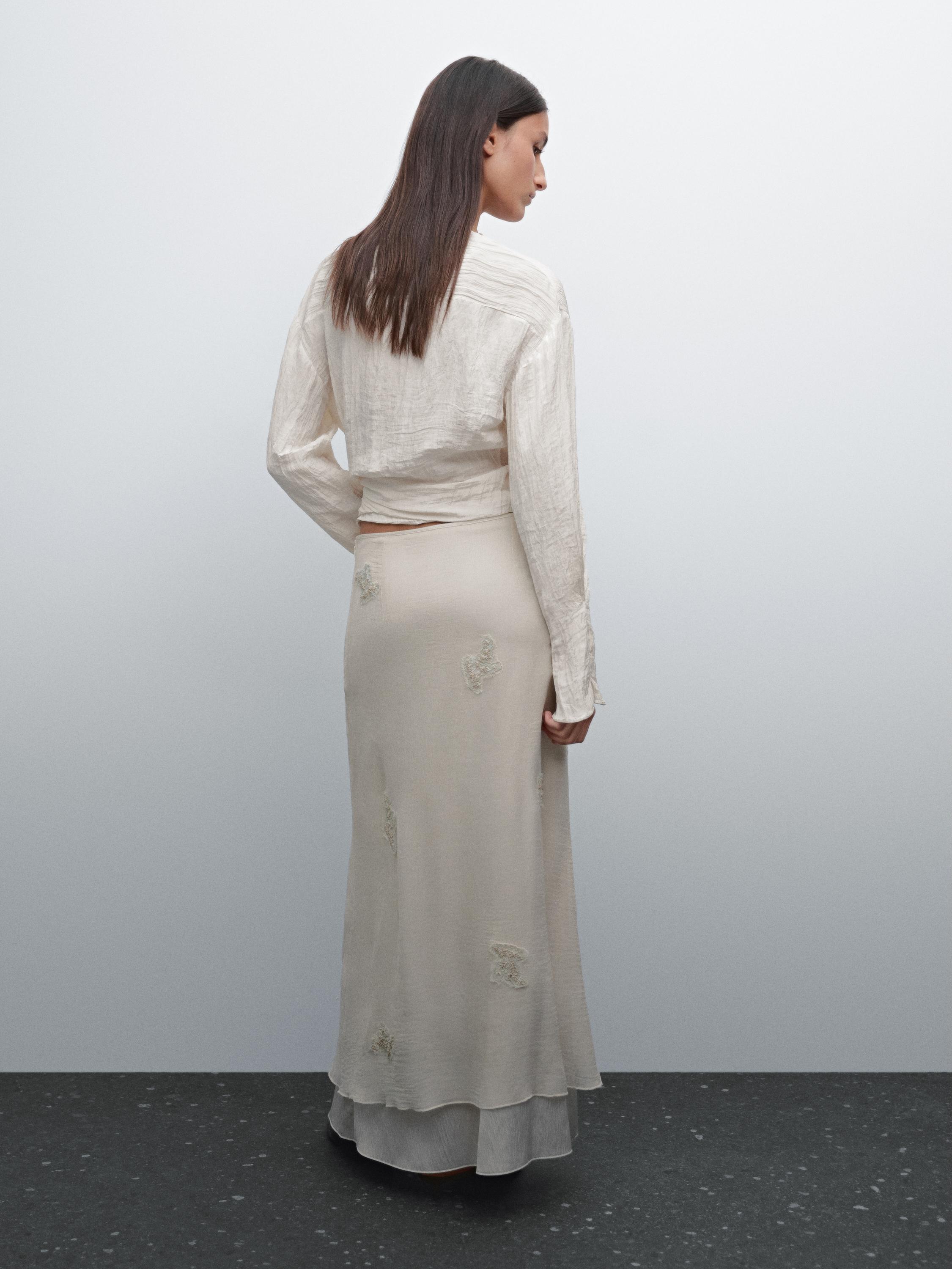 Jupe midi brodée