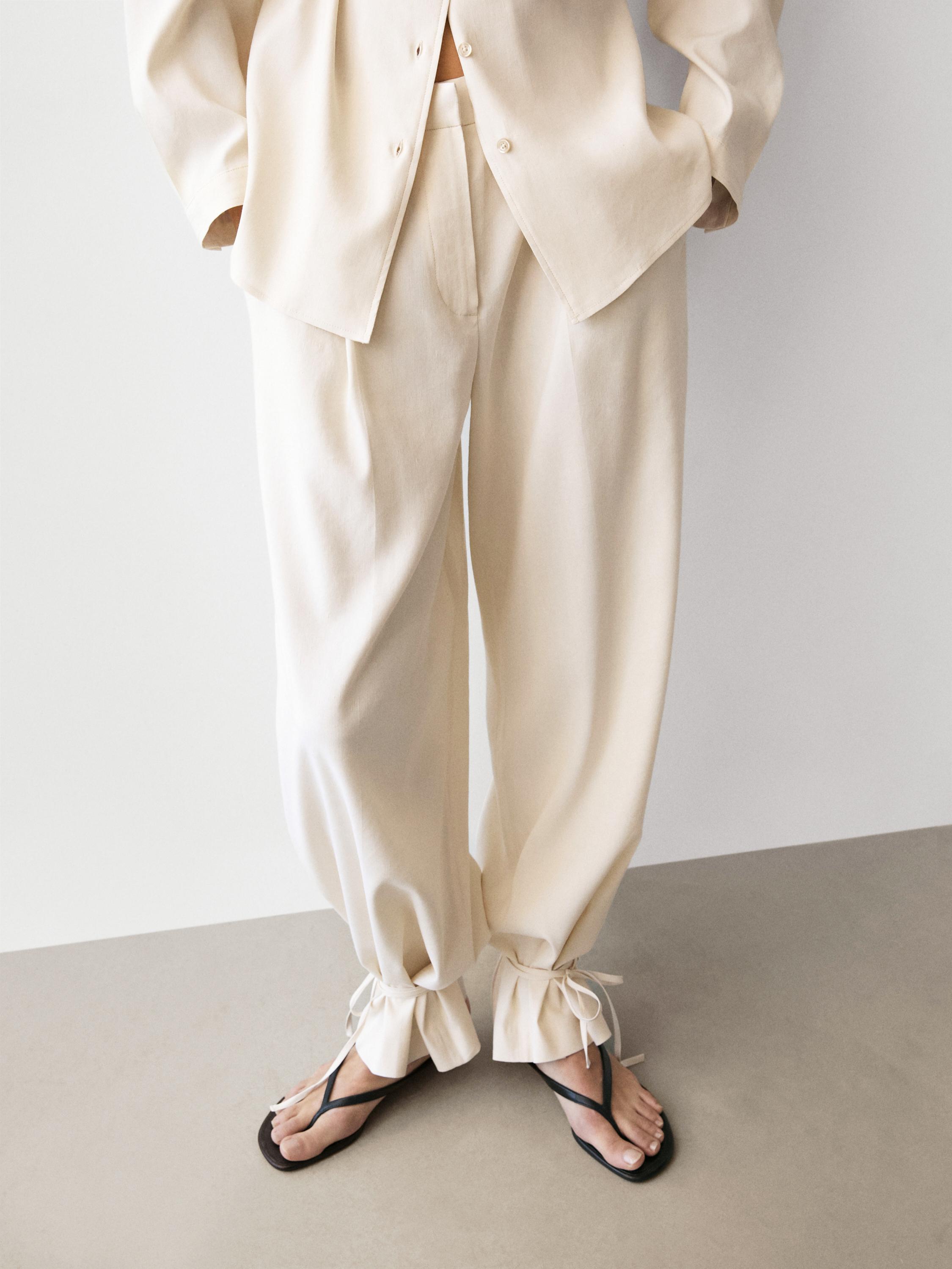 Flowing barrel fit trousers — CREAM