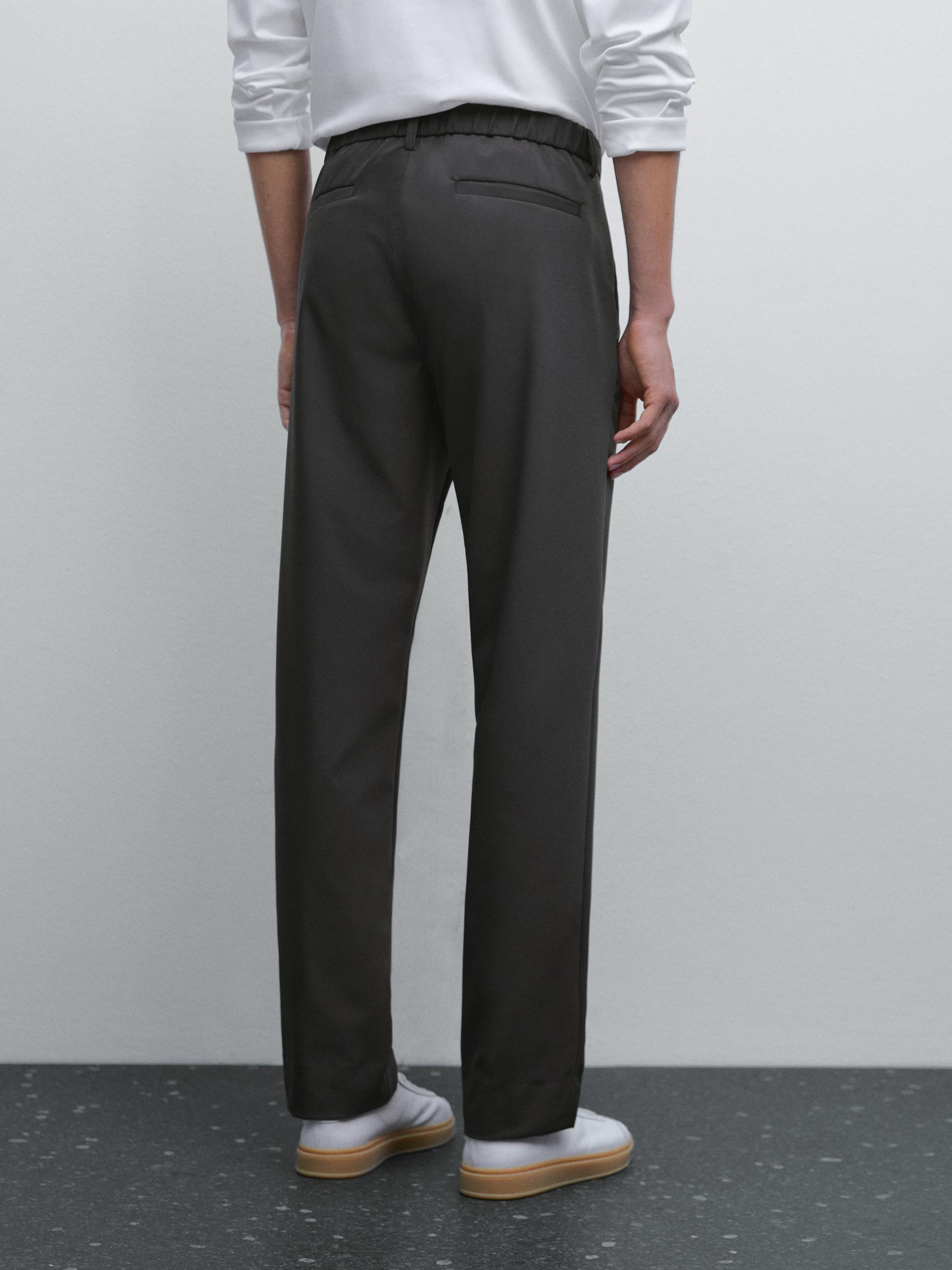 بنطلون تقني بقصة منتظمة