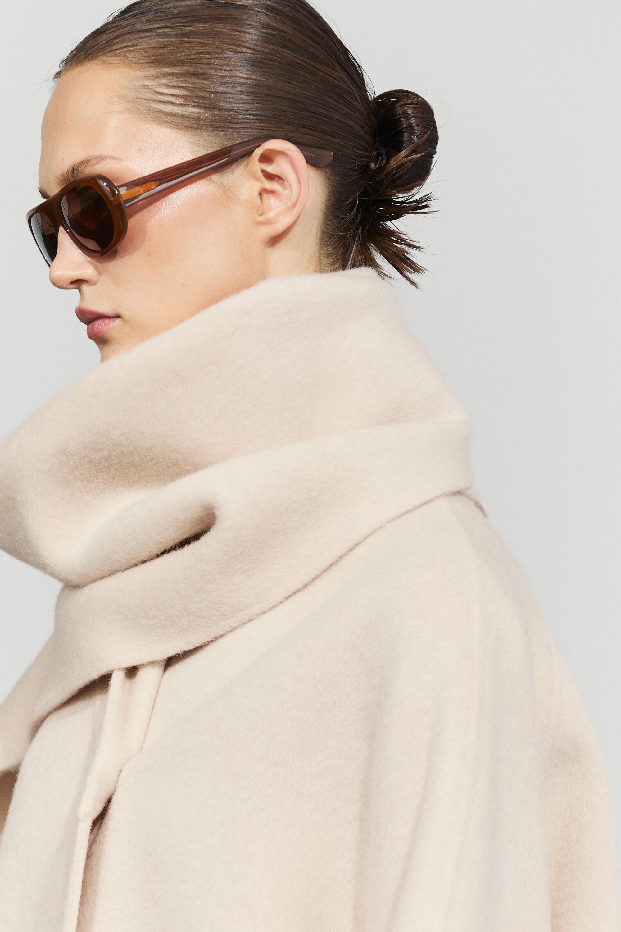 Oval tortoiseshell-effect sunglasses — BROWN