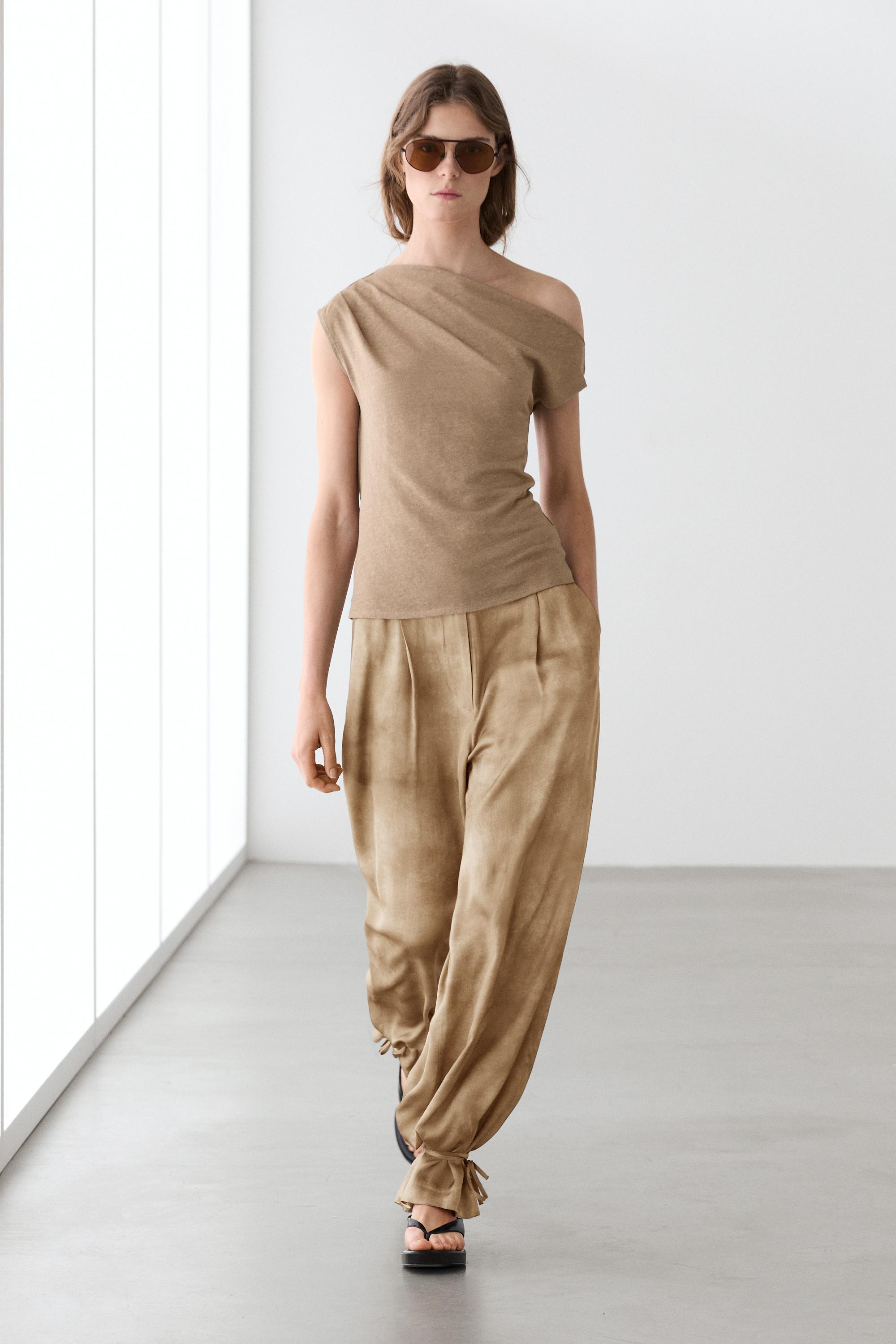 Asymmetric linen blend top with draped detail — Washed