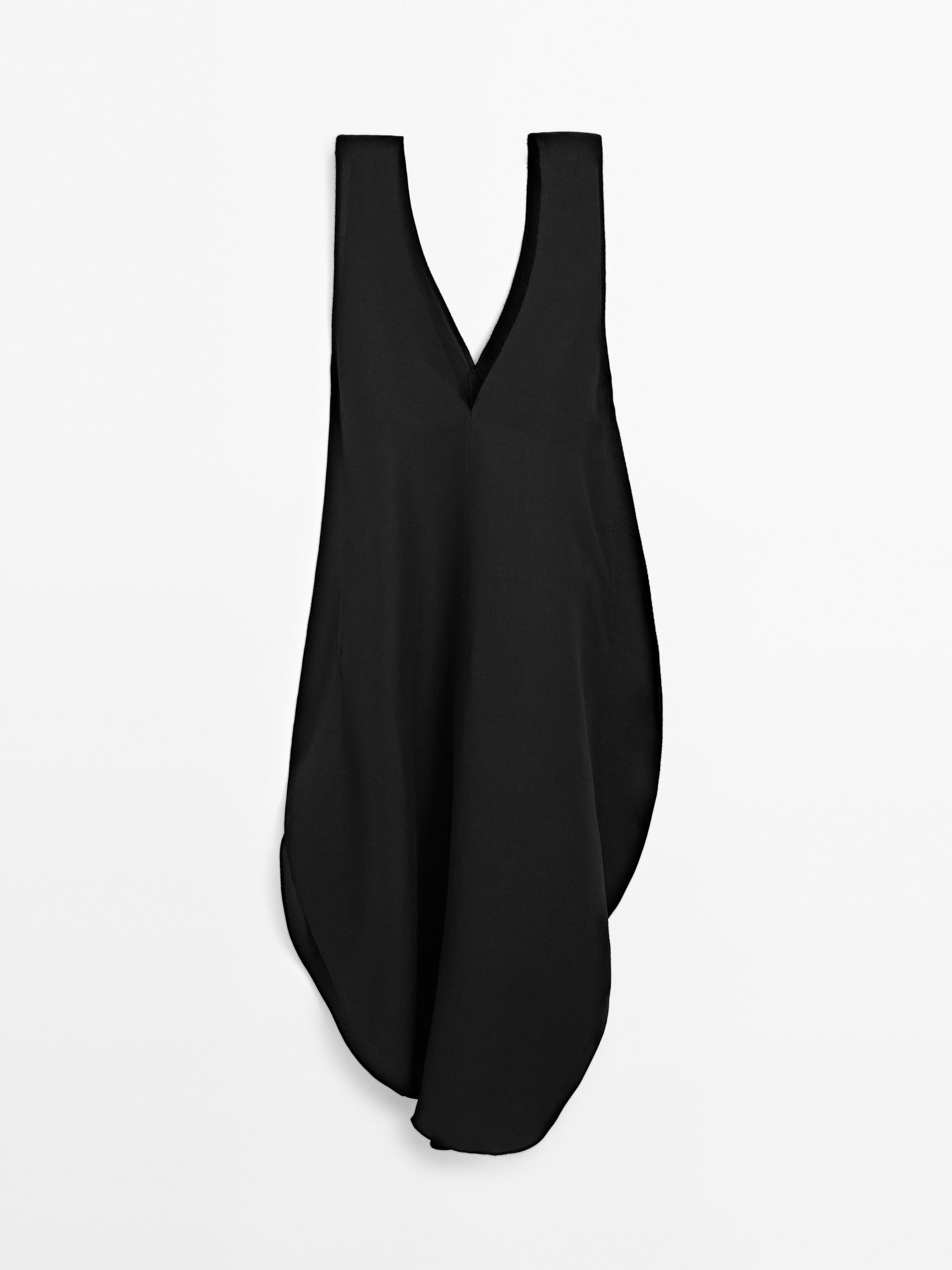 Langes Kleid mit rundem Saum - Limited Edition