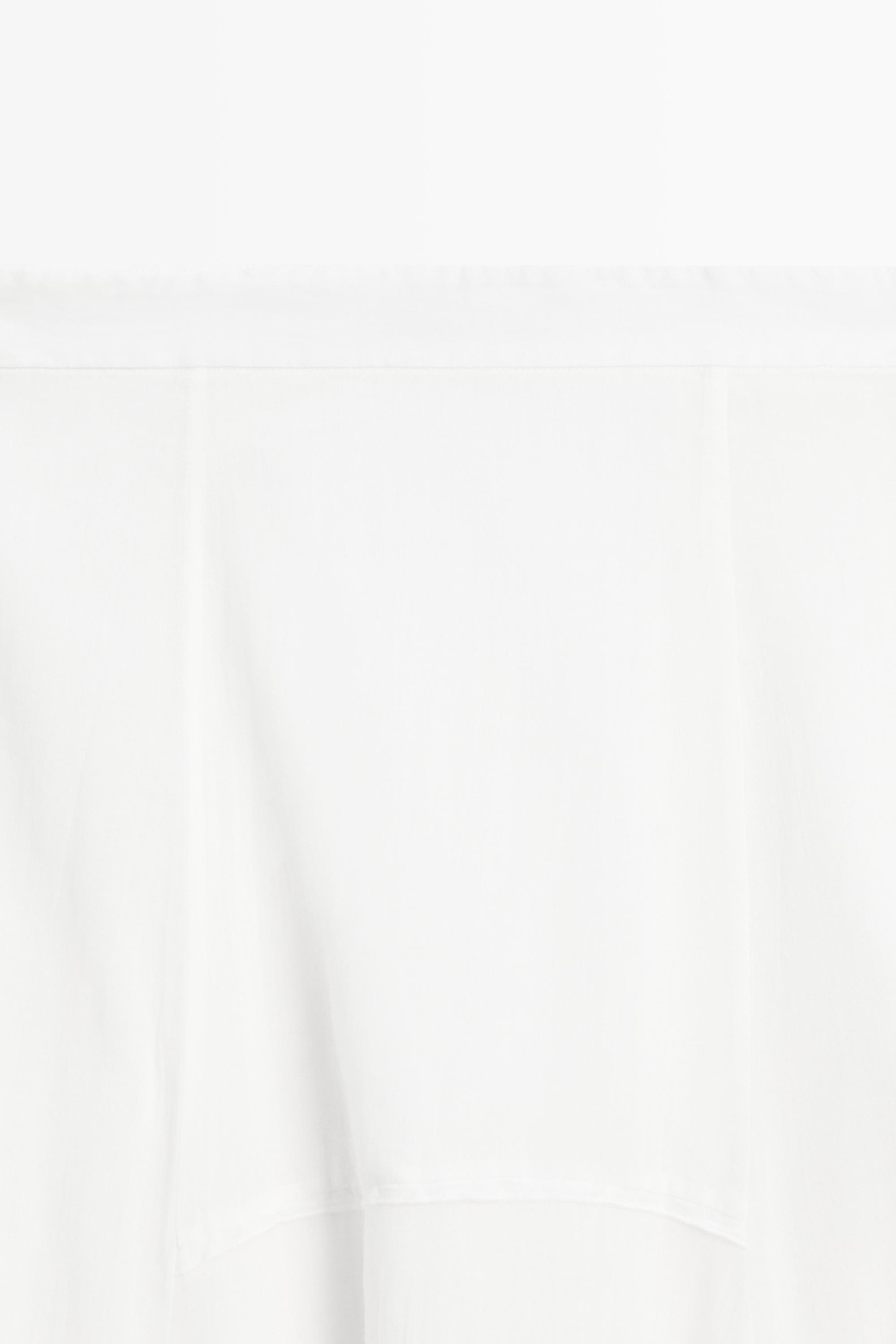 Flowing midi skirt with panel detail — WHITE